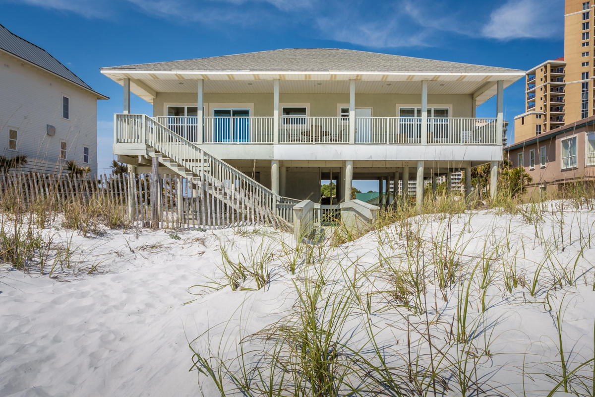 Home is on a vacation rental program and after summer season will be torn down to prepare this 100 foot beach lot for a new home. The present rental income is approximately $135,000 per year.
THIS BEACH LOT IS A RARE 100 FOOT GULF FRONT LOT IN THIS WHOLE EMERALD COAST REGION AVAILABLE FOR A NEW BEACH HOME.