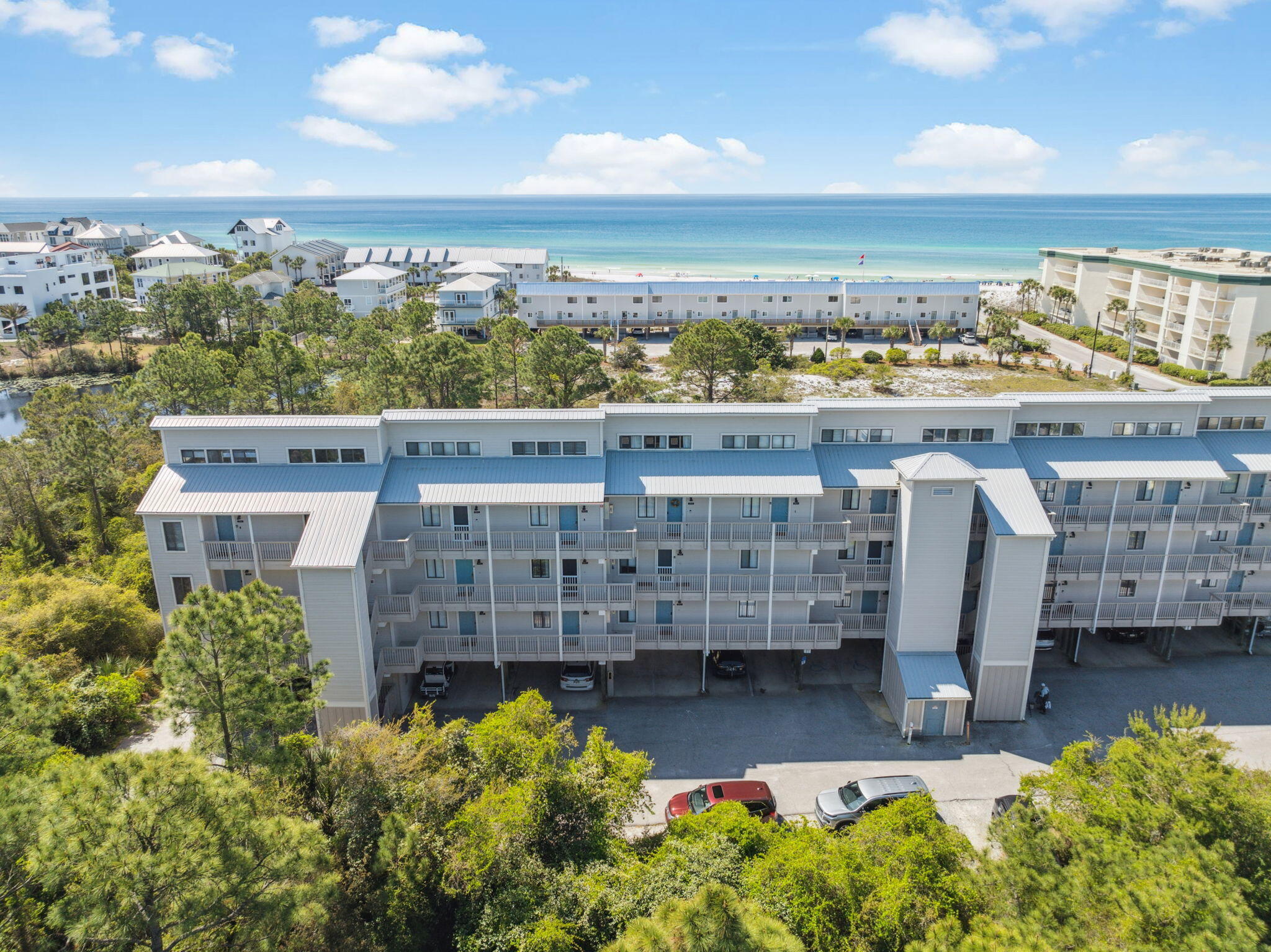 NEW HVAC INSTALLED JANUARY 2026. Welcome to this adorable coastal studio tucked on the quiet south side of 30A, perfectly positioned between Watersound Beach and Seagrove. Just steps from Walton Dunes Beach Access, you're moments away from sugar-white sand, emerald water, and easygoing beach days.

Inside, it's all about fresh coastal charm. Luxury vinyl flooring flows throughout, complemented by a shiplap accent wall that gives it that clean, craftsman feel. The updated kitchen shines with Quartz countertops, new cabinetry, a chic breakfast bar, and a stainless steel farm sink.

The bathroom feels like a spa getaway with a tiled shower, pebble flooring, and a glass tile accent that adds the perfect pop.

Low maintenance, high style, unbeatable location! This one is pure 30A magic. Maximizing space and functionality, the studio includes a Murphy bed with built-in cabinetry and additional hallway closets for extra storage. A sleeper sofa allows the property to comfortably accommodate up to four guests, making it a great rental investment.

Step outside to a large private balcony overlooking the pool and beautifully landscaped groundsa perfect spot for your morning coffee or to unwind after a day at the beach.

Whether you're looking for a personal getaway or a high-performing investment, this studio delivers exceptional rental returns, with rental projections estimated at $40K - $50K annually. Step into paradiseyour dream coastal retreat awaits!