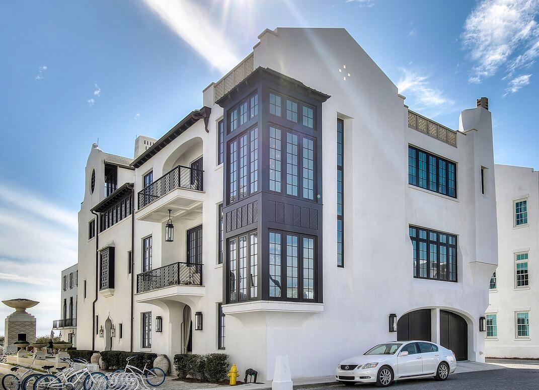 Exquisite Alys Beach home with forever Gulf Views!!! Four bedrooms, four and a half baths, highly coveted, full sized, two car garage and a custom designed elevator! From the rooftop terrace, enjoy amazing sunsets by the fireplace or the outdoor entertainment center. Never rented, this luxurious home is located on the Gulf Green, just steps from the white sand. Newly constructed, Architect Domin Bock designed a stunning example of modern elegance. The attention to detail is exquisite from quartz tile in the foyer to the custom kitchen with the spectacular Woodmode cabinetry and the Mother of Pearl backsplash is exquisite surrounding the Thermador Range. The beverage center built with double refrigerator drawers, wine coolers and an ice maker is perfect for social gatherings. The elegant and cozy breakfast nook overlooking the Gulf Green is ideal for enjoying morning coffee from the built-in Miele espresso machine. Two balconies with fully opening accordion doors on truly accentuate the open floor plan complete with beautiful European Oak floors. The state of the art geothermal heating and air system is highly efficient and cost effective year round. The entirety of home is equipped with magnificent custom lighting, walk-in closets and abundant storage provide for an excellent primary residence or perfect retreat at the beach. After a relaxing day at Caliza Pool, you can watch the sunset then movies under the stars on the rooftop terrace. Call today for your private showing.