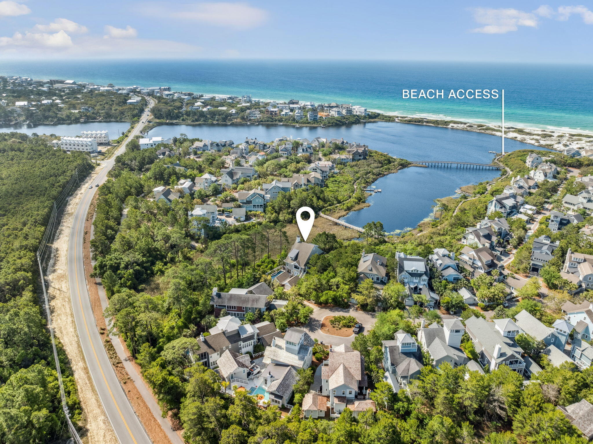 A special opportunity to make a special lakefront home, nestled in the sought-after gated community of Watersound Beach on 30A your own. Boasting panoramic Gulf views and a perfect blend of privacy, luxury, and design, this 5-bedroom residence is an entertainer's dream. The home features four spacious king-sized ensuite bedrooms plus a super bunk room with four queensized bunks, The upstairs living area, centered around a gas fireplace, serves as the perfect gathering space for family and friends after a day spent exploring over a mile of pristine Gulf-front beach and the stunning dunes of Watersound. The gourmet kitchen is a chef's delight with a large island and space for multiple cooks while enjoying breathtaking views. There is so much more! The open-concept living and dining areas also offer sweeping views of the water, while expansive porches on every level totaling over 1,000 square feet provide ideal outdoor spaces for relaxation and entertainment. For added enjoyment, the lower level features a media room and game area, creating a dedicated space for fun, family bonding, and entertainment. The private heated pool with upgraded glass tile and fountains is a true oasis, offering the perfect spot to unwind and enjoy the serene surroundings. This exceptional home offers all the amenities for luxury coastal living from the large outdoor living areas to the stunning lakefront location with unparalleled Gulf views.  This is what you have been searching for!