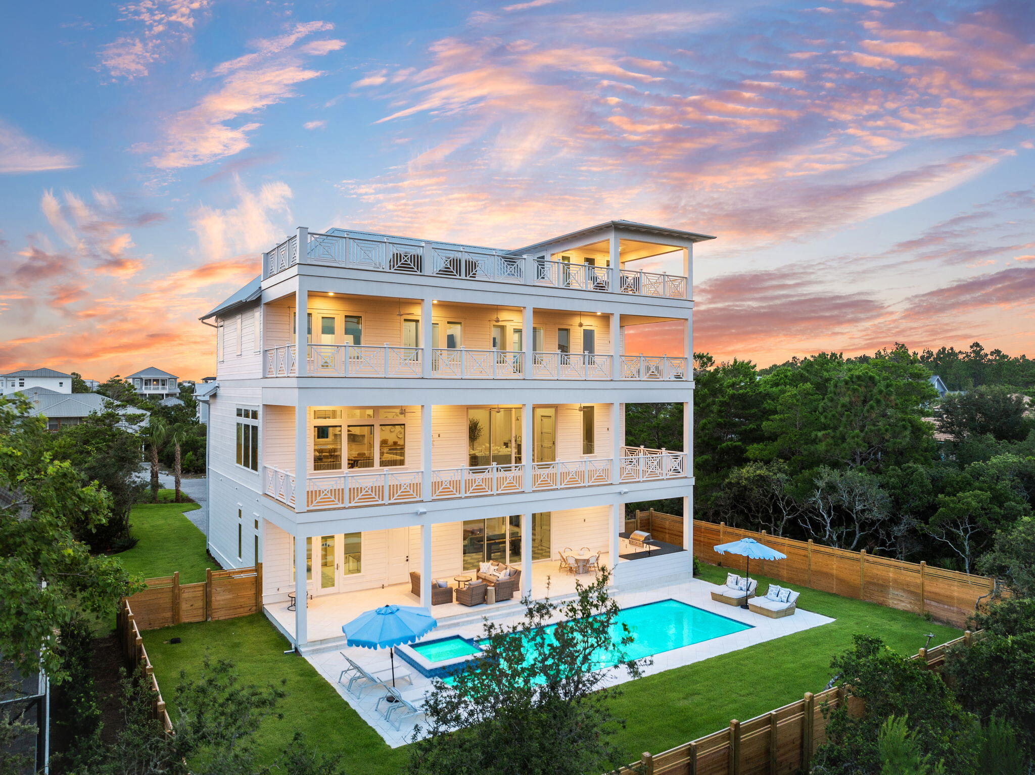 Welcome to the luxurious 100 Brenda Lane boasting PRIVATE DEEDED beach access and breathtaking sunrise-to-sunset gulf views from the rooftop deck. This contemporary Inlet Beach stunner epitomizes beach living at its very best, offering 8 stunning bedrooms and 7.5 luxurious bathrooms that will leave you in awe.

From the serene courtyard entry to the open layout and high ceilings, this home exudes sleek and stylish living at every turn. The huge game room features a wall of glass that opens up onto an oversize paver deck, pool, lanai, and raised spa, creating a seamless flow between indoor and outdoor living that is perfect for entertai