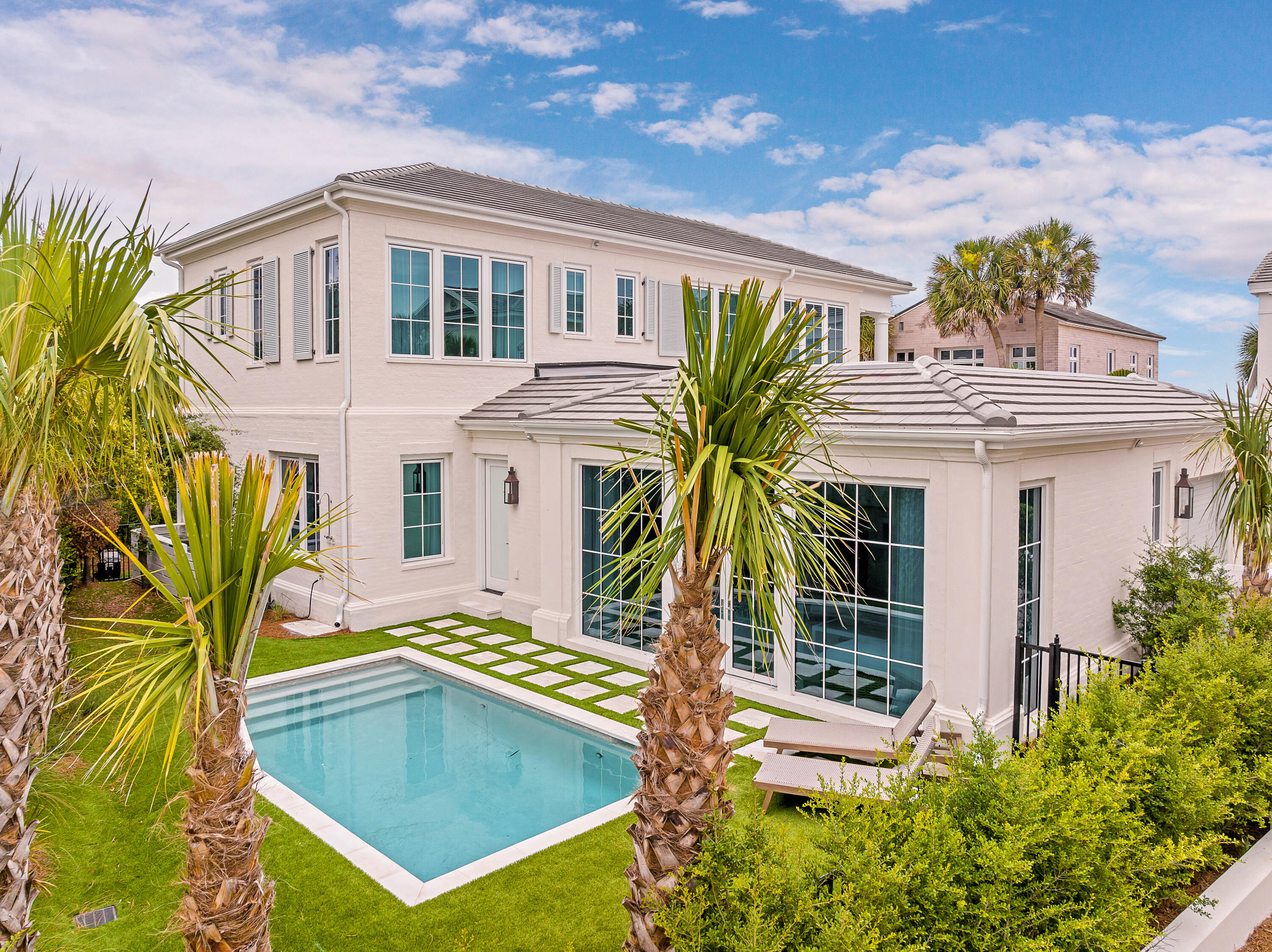 Experience luxury and coastal elegance in this exquisite custom built home located within the prestigious private gated property of Jasmine Dunes in Seagrove beach. Situated in a second-tier location, the property offers breathtaking views of the Gulf, ensuring a serene and exclusive coastal living experience. Step outside your door and within one minute you'll find yourself on the pristine white sands of the Gulf, accessible via an exclusive private beach reserved solely for property owners of Jasmine Dunes. Crafted by the renowned award-winning developer Benecki Homes of Atlanta and designed by acclaimed designer Melanie Turner of MTI Atlanta this home exemplifies superior craftsmanship and attention to detail. This meticulously designed home meets every expectation with its well thought out layout and luxurious features. Boasting 4 bedrooms each with its own en-suite bath it provides ample space for family and guests. The lower level features a family room overlooking a private pool, perfect for relaxation and entertainment. A fitness room adds to the homes amenities, catering to a lifestyle of wellness and leisure. The second level is designed for seamless indoor/ outdoor living with the living dining and kitchen areas all offering stunning views of the Gulf. An elevator ensures easy access between floors, while the oversized single garage provides convenient parking and storage. No detail has been overlooked in the customization of this home, featuring Venetian plaster walls, French oak flooring, and select marble in all baths adorned with Kohler and Waterworks fixtures. The kitchen is the chef's dream, equipped with Wolf and SubZero appliances, complemented by Italian cabinetry. Outdoor living is equally impressive, with the second level terrace providing a perfect spot to enjoy the Gulf views and coastal breezes. This home at Jasmine Dunes not only meets but exceeds all expectations of luxury coastal living, offering unparalleled comfort, elegance, end exclusivity in one of the most desirable beachfront communities on the Gulf Coast.