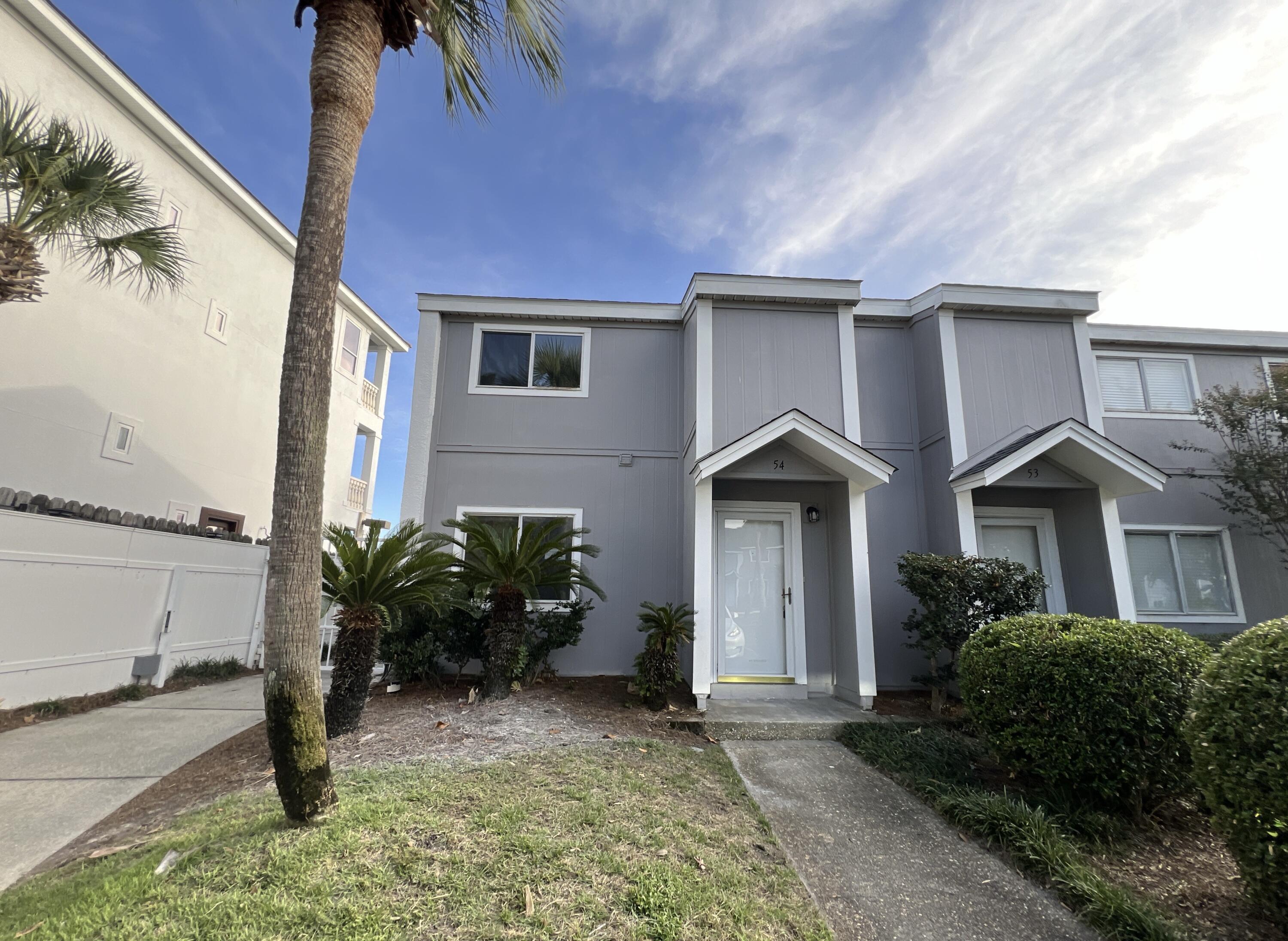 Welcome to your completely renovated 2 Bed, 2.5 Bath REO oasis in Destin. This turn-key unit features stunning views of the serene Lake of South Bay—perfect for a peaceful primary home or high-yield rental. The interior boasts a chic, modern makeover: LVP flooring throughout, fresh paint, and a chef-ready kitchen with elegant granite tops and brand-new stainless steel appliances. This unit was originally built in 1974 and is just under 1200sf. HOA has just installed a new dimensional shingle and continue to make updates to the exterior decking on many of these unit. A must see. Schedule your showing today!