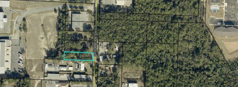 PROPERTY CURRENTLY ZONED C2 HAVE CONFIRMED IT CAN BE REZONED TO C1. MAKING THIS A PREFECT OPPORTUNITY FOR AN INCOME PRODUCING PROPERTY. S Located near hospital, medical offices, medical facilities, shopping and schools. 
There are 2 additional lots that a buyer can buy all 3 lots to build possibly up to 36 apartments.  Buyer to verify all areas of importance to include lot size, zoning.