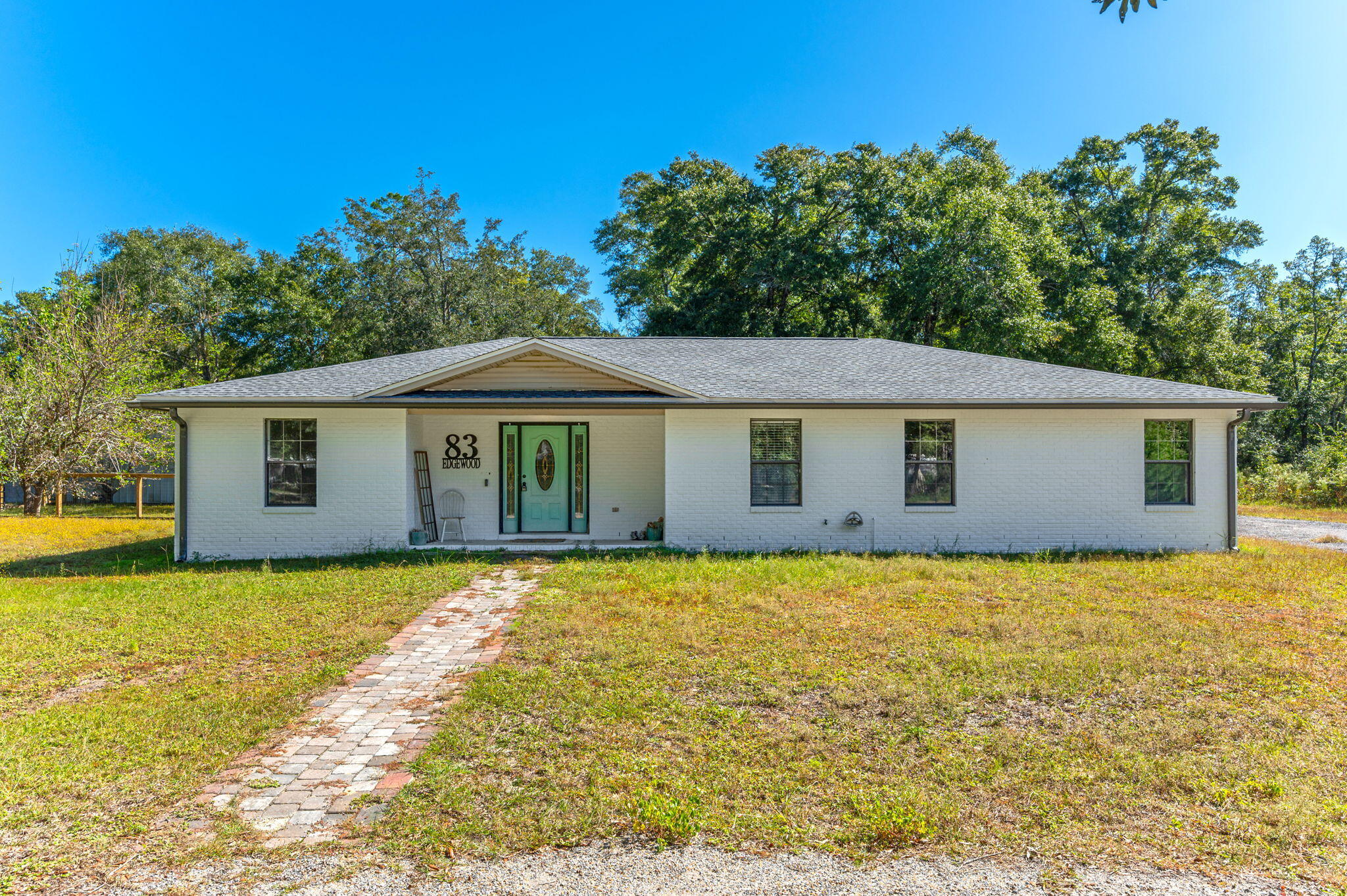 $2600 with the Barn included!
Prime Location! Less than 15 minutes to Freeport, Bluewater Bay, and Niceville. This 3-bed, 2-bath brick home with attached 2 car garage sits on nearly an half of an acre with no HOA. The open kitchen features oak cabinets and Corian countertops, flowing into a spacious living area. The master suite includes dual vanities, a walk-in shower, and his-and-her closets. Enjoy a landscaped yard with fruit trees. A must-see rental! 60x30 Barn Included with this rental.
 Requirements include all adults having a credit score of 600 or better, one year on the job or employment offer letter and monthly household income of $6250.
