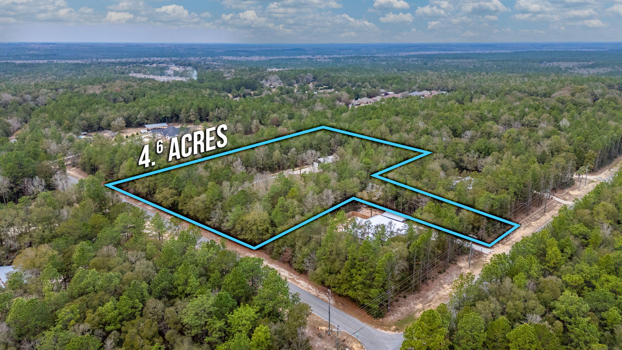 4.64 acres with a second homesite clear and ready. Escape to the country charm of Northwest Crestview with this unique property offering endless possibilities! This listing features a beautiful 3-bedroom, 1-bathroom barndominium, perfect as a guest house or a cozy retreat.  Imagine welcoming friends and family to their own private space, or enjoying the quiet tranquility yourself.
Beyond the barndominium, this property presents a fantastic opportunity to build your dream home.  The main homesite is prepped and ready with underground power already in place - all you need is your vision and house plans!  Design the custom home you've always dreamed of, perfectly situated on this beautiful piece of land.
Enjoy the laid-back lifestyle of Northwest Crestview, while still being convenient located by all the action.  With easy access to Hwy 85, Hwy 90, and Interstate 10, you can effortlessly reach the stunning beaches of the Emerald Coast, premier shopping destinations, and exciting entertainment venues.  Crestview itself offers a wide array of amenities, including diverse dining options, convenient shopping, and local entertainment, ensuring you're never far from everything you need.  Don't miss this chance to create your ideal country escape with the perfect blend of peaceful living and convenient access to everything Northwest Florida has to offer!

Zoning is Rural Residential