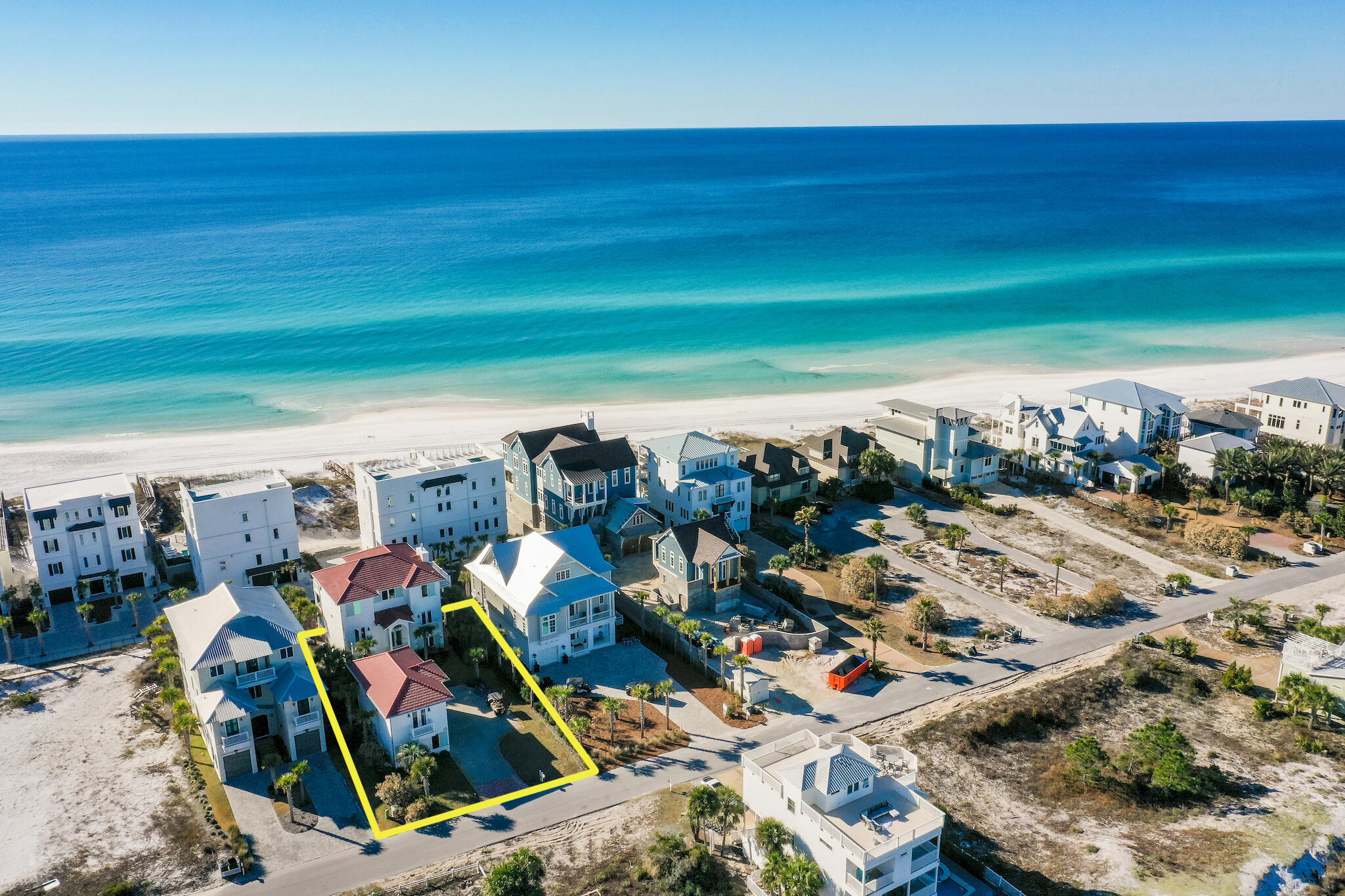 Pinch me! That's exactly what you'll say as the owner of this coastal beach home located in the heart of Seagrove Beach, south of 30A. Pinch Me is pure luxury that affords views of the Gulf and one of 30A's Coastal Dune Lakes, Eastern Lake. This property features a main house with six bedrooms, plus a carriage house above a three-car garage that boasts a seventh bedroom, with full kitchen and living room. This seven-bedroom property can serve as a primary or second home and has excellent rental income potential. From its eclectic artwork, to the cozy furnishings and thoughtful gathering spaces; every detail encourages conversation and relaxation. Enjoy the coastal breezes and the best of indoor-outdoor living while gathered around the private pool, dining on the screened ... ..in porch, or relaxing on one of the home's two wraparound balconies.

One of the home's many features is its ability for family and friends to experience both community and privacy in the same abode with its numerous indoor and outdoor living spaces. Around every corner you will find cozy nooks where you can hide away for an hour or two to read a book, enjoy an early-morning cup of coffee, or enjoy a glass of wine as the sun sinks into the Gulf. Each bedroom is its own separate retreat, and the private carriage house, complete with its own chef's kitchen, living area, and bedroom, is the ideal getaway for a little more intimacy and solitude. When you're ready to socialize again, the airy, connected kitchen, dining room, main living area and third floor balcony are large enough to accommodate any family gathering.

The well-appointed chef's kitchen is open to the living and dining areas and features granite countertops, custom cabinets, and high-end stainless appliances, making entertaining a breeze for any host. The floor-to-ceiling windows offer expansive views of sunsets over the Gulf and Eastern Lake. As the owner of this luxury home you are steps away from the white sands beaches and turquoise waters of which Seagrove and 30A are renown. Spend a day with the sand between your toes and then plunge into your own private pool to relax after a day at the beach. If you love activities, the three-car garage has more than enough room to house all your toys, with plenty of room for Jeeps, golf carts, bikes, paddle boards and other toys. Within walking distance of Pinch Me, are two beach access points. In addition to the nearby beach, there are dunes, lakes, and state parks within easy biking or driving distance; along with cute seaside shops and eateries for you to discover. Call to schedule an appointment to see this exceptional luxury home in person and you too will be saying, Pinch Me!