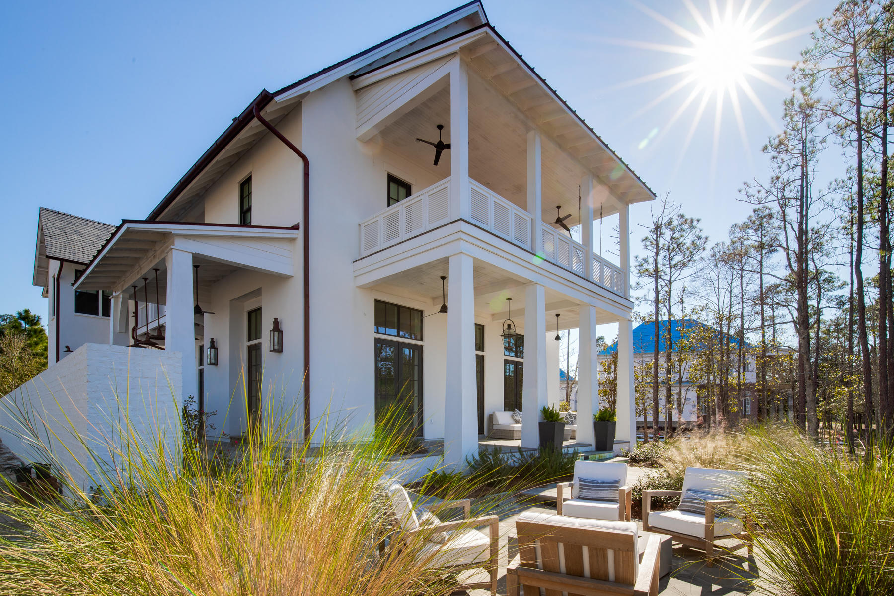 This stunning bay view home located in Churchill Oaks is designed by Savoie Architects with unparalleled coastal style and finish level. The main residence offers 3 bedrooms, 3.5 bathrooms, 2-car detached garage, and a 1-bedroom, 1-bathroom carriage house. Extraordinary finishes through ought this home include reclaimed hardwood flooring throughout, tongue-and-groove ceiling, white brick accents, custom tile, quartzite counters, white shaker style cabinets, designer light fixtures + more. Enjoy quiet evenings on the wide covered porch with a fire pit gorgeous views of the Bay. The courtyard situated right off the expansive kitchen offers an outdoor dining area with a summer kitchen and beautiful water features. Nestled on 40 acres in the bend of Churchill Bayou and Hogtown Bayou in the Choctawhatchee Bay, you'll find Churchill Oaks, a new residential community designed to embrace all the beauty that nature has to offer. The all new private, deep water marina is now available for owners to purchase a boat slip ranging from 31' to 70'. The marina project includes 36 private boat slips, paddle board storage decks, a fish cleaning station, shoreline stabilization + more! With over half a mile of waterfront footage on South Walton's iconic Choctawhatchee Bay, Churchill Oaks offers a lifestyle like no other. Nearly every homesite features outstanding water views with room to accommodate courtyards, outdoor kitchens, and gardens so each home connects with its natural setting. The whole community is thoughtfully designed around Southern magnolias, live oaks, and longleaf pines, leaving 40% of the property green and natural creating an environment well suited for the community's Low-Country architecture that accentuates the style and grandeur of the south. Please verify with on-site agent the total New Buyer fees due at closing.