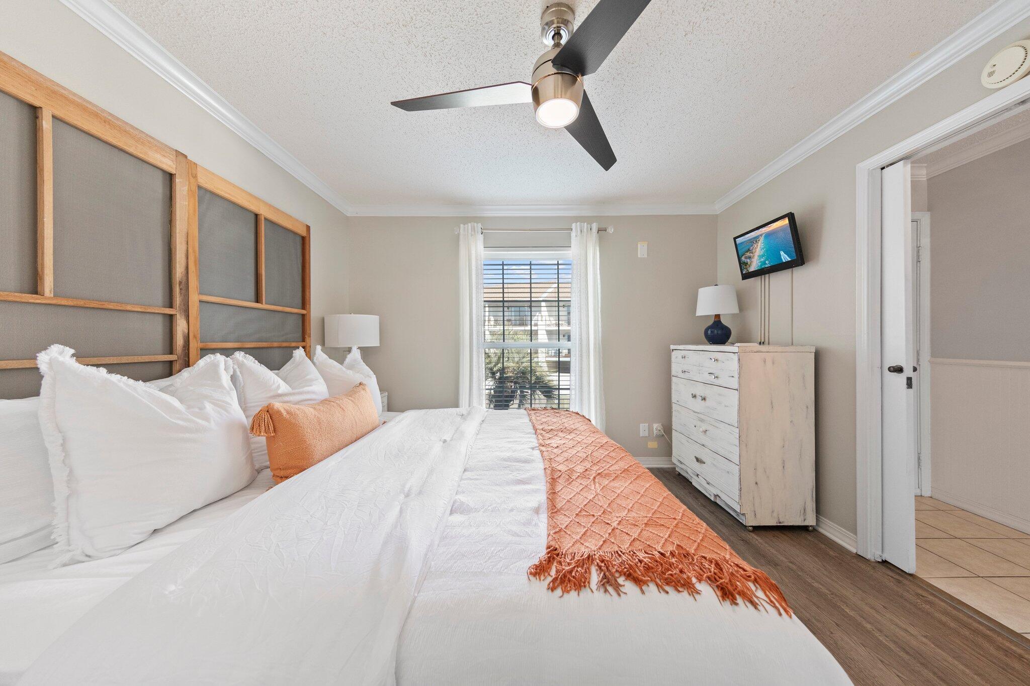 One of the best views & locations in Destin! Directly across the street from the beach & Pompano Joes with FULL VIEWS OF THE GULF! Located in the front portion of the complex and situated on the iconic Scenic Hwy 98. This unit overlooks the swimming pool with an incredible view of the Gulf of Mexico! You don't even need a golf cart because you're already there!

Roomy 1 bed 1 bath with hallway bunk beds. The bathroom has been fully renovated! Other upgrades include the floors, freshly painted 'Agreeable Gray', and all new lighting and fans. The brand-new sleeper sofa and furnishings are all included!

The special assessment has been paid in full for this unit. The entire complex has been refreshed with trex decking and new aluminum railings (breezeways, stairs & pool surround).