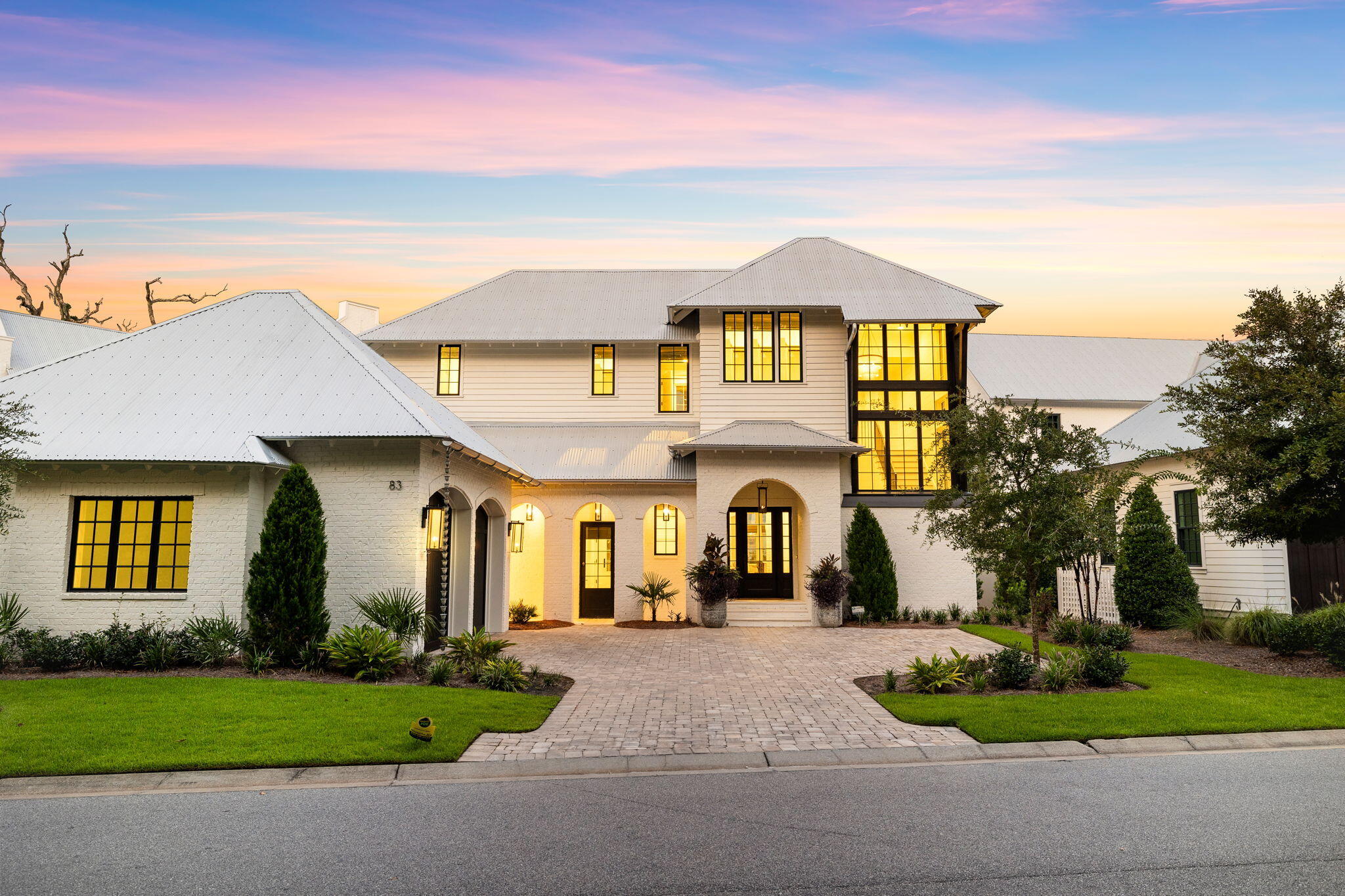 36 Foot deep water boat slip with oversized lift INCLUDED with this spectacular home. Experience refined coastal living in the sought after Churchill Oaks neighborhood with this stunning 4-bedroom, 4.5-bathroom home, offering 3,610 square feet of thoughtfully designed space where luxury meets effortless comfort. Crafted for both everyday living and elegant entertaining, the open-concept layout seamlessly connects the interior and exterior. The expansive outdoor living area is a true showstopper—complete with a sparkling pool, inviting fireplace, and a fully equipped outdoor kitchen—ideal for relaxing evenings or hosting gatherings in style. This home perfectly blends timeless sophistication with modern convenience, all set within one of the most sought-after communities.