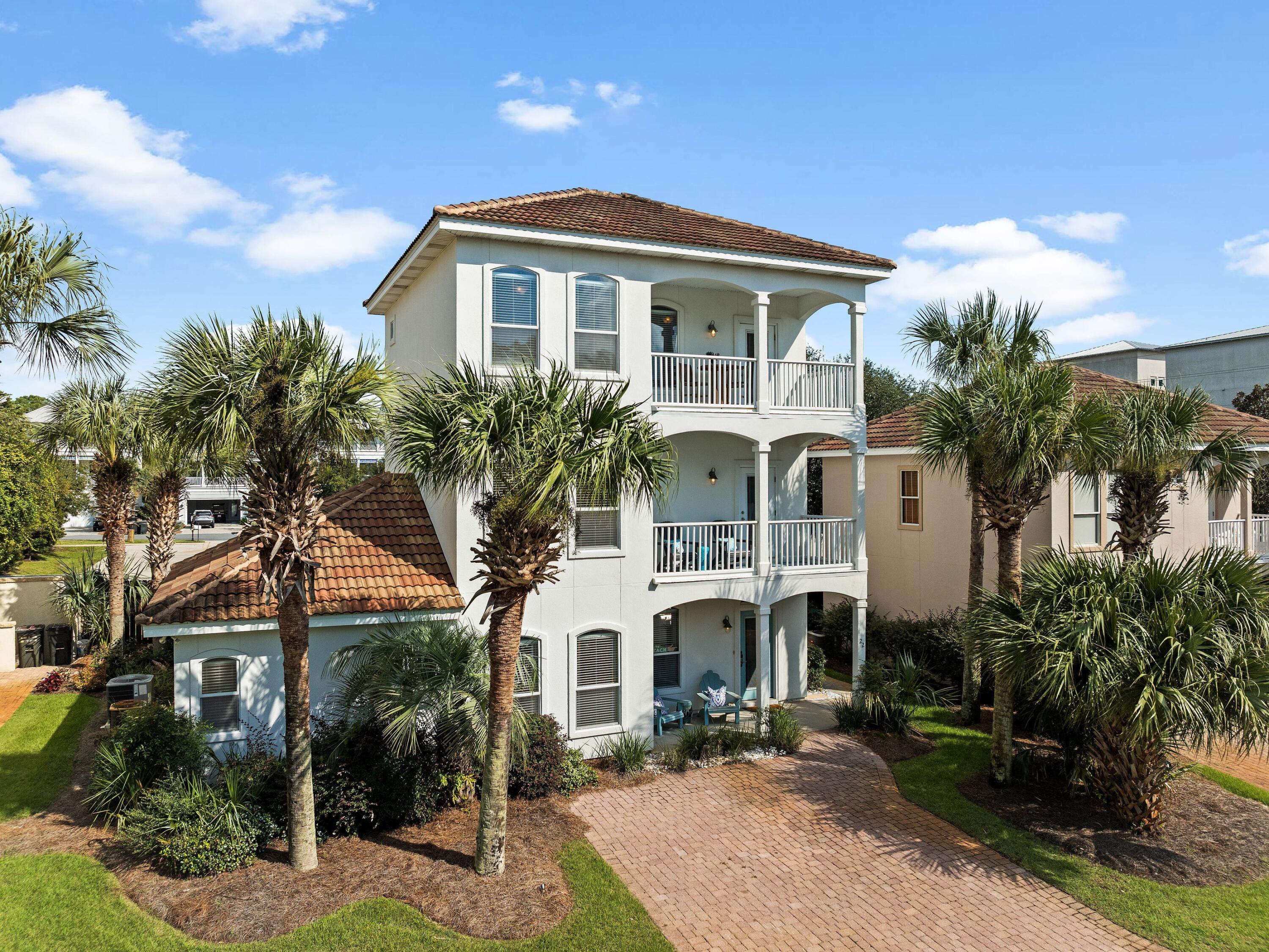 Experience the ultimate 30A beach lifestyle with Aqua Seas, a stunning three-story Mediterranean-inspired beach house Las Palmas community. Just a short walk to Spooky Lane and Shell Seekers Beach Access and nearby dining and shopping options, this fully furnished five-bedroom, 3.5-bathroom home is perfect as a vacation rental, second home or even a primary residence. With gulf views and an additional bonus room on the third floor that can serve as a fifth bedroom, den or office space, this property offers both luxury and versatility. Step inside to an open-concept first floor, where neutral tones and coastal-inspired décor create a relaxed, chic atmosphere. The spacious living area flows seamlessly into a well-appointed kitchen featuring granite countertops, stainless steel appliances and seating for 10. Perfect for entertaining, the living space opens to a large patio with a grill and plenty of room to unwind.  The master suite is conveniently located on the main level, while the upper floors host additional bedrooms, including a third-floor room with panoramic gulf views. Luxury vinyl plank flooring stretches throughout the home, offering easy maintenance and modern style. Recent updates, including a refreshed kitchen and a newly added paver patio in the backyard, enhance the home's appeal. Located near Gulf Place, Aqua Seas offers proximity to 30A's best bike trails, nature paths, and popular dining spots like Shunk Gulley. With access to four nearby beaches  Ed Walline, Shell Seekers, Spooky Lane and Gulf Heights  your coastal paradise awaits. Whether seeking a tranquil retreat or an investment opportunity, this home delivers on all fronts.