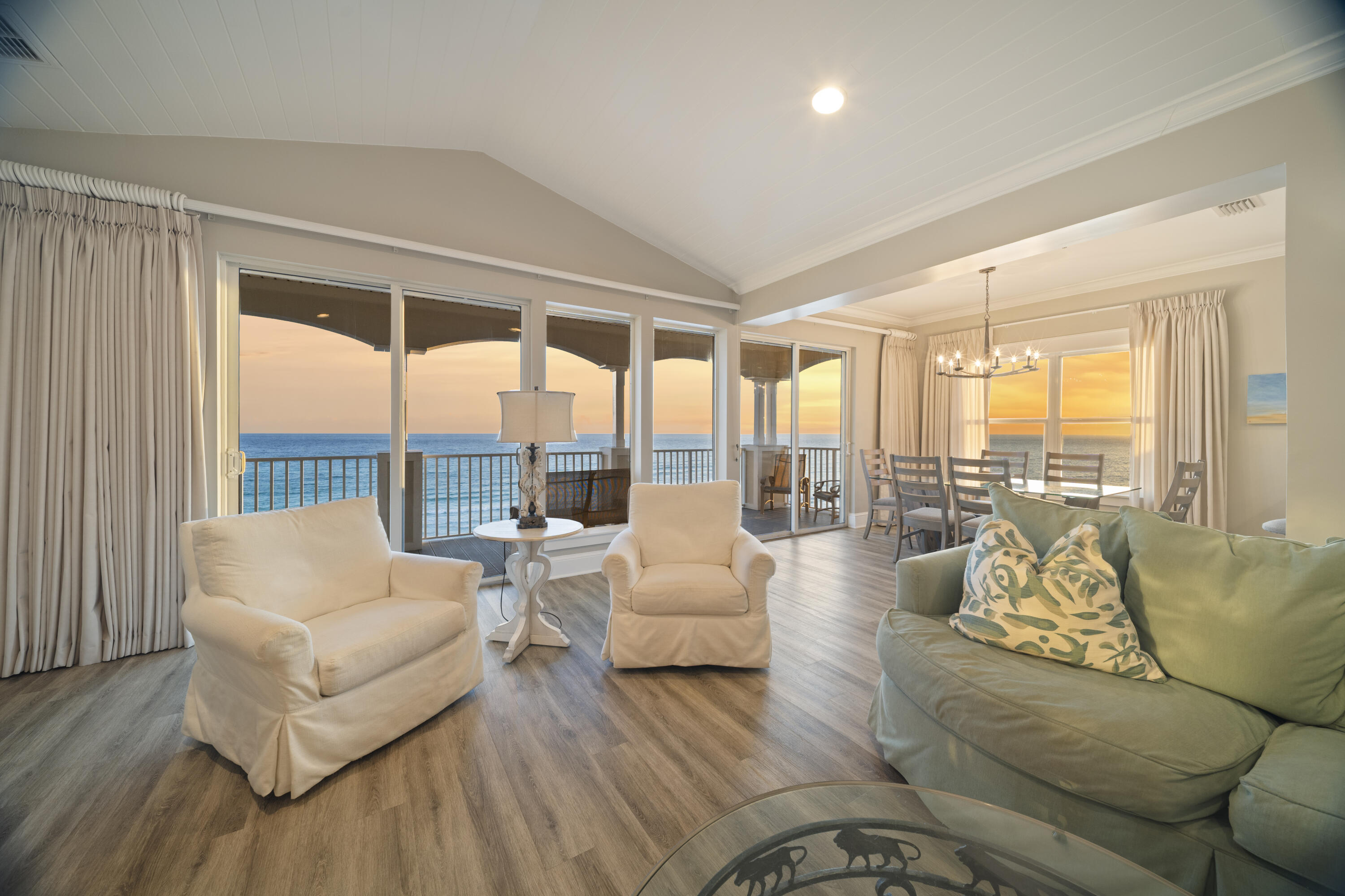 Perched on the top floor of one of Seagrove's most coveted Gulf front addresses, Unit 300 at Seaview I delivers something exceedingly rare along the 30A Corridor: completely unobstructed panoramic views of the Emerald Coast in both directions. At 32 feet of elevation and a prominent southerly positioning, the sightlines stretch endlessly -- southeast and southwest -- across the famous sugar white sand and emerald waters. There is simply nothing between you and the horizon.

A sweeping 50-foot colonnade porch serves as the unit's outdoor living area, built for taking in sunsets, morning light off the water, and everything in between. Floor-to-ceiling windows wrap the interior, dissolving the boundary between inside and out and flooding every room with natural light and Gulf views. The effect is immersive -- you feel the water from every angle.

Inside, the 2,102-square-foot layout is anchored by a generous open-concept living area with soaring vaulted ceilings that amplify the sense of space and elevation. 4 bedrooms and 3.5 baths offer real capacity for family or guests without compromise. The entire unit has been thoughtfully remodeled with light quartz countertops, luxury plank flooring, and fresh paint throughout -- clean, modern finishes that complement the views. A full-sized garage rounds out the practical details.

Beyond the unit itself, the location is peak 30A. You're steps from the beach and a short bike ride to Seaside and WaterColor for high-end dining, shopping, and the effortless coastal lifestyle that draws people here. Alys Beach and Rosemary Beach are just a short drive away. This is the rare property where you don't choose between Gulf front living and access to everything 30A offers -- you get both, from the best seat in the house.