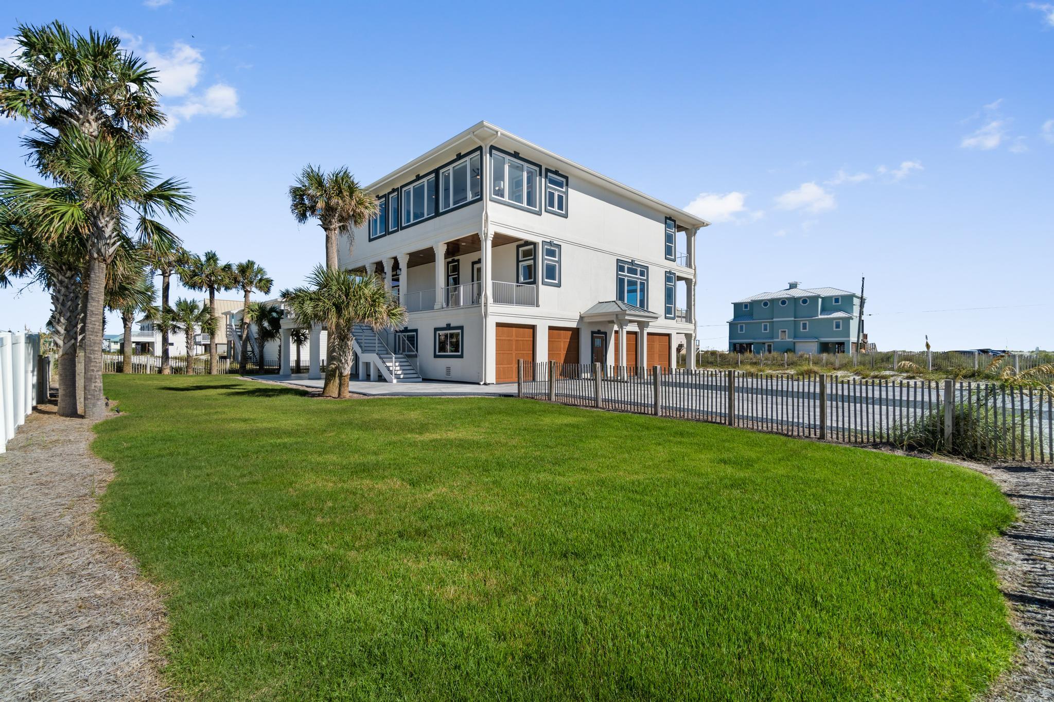 This luxurious, exclusive home on Navarre Beach is nothing short of breathtaking. Renovated and updated, this coastal beauty is directly across from public beach access with unobstructed gulf views. This home has been meticulously maintained, updated, and furnished with no expense spared. It features 5 beautifully furnished bedrooms including 2 Gulf-facing master suites, plus a multi use room with sound views. The main level boasts Italian Marble floors, 2 finely furnished living spaces, a custom made chandelier with a powered winch for ease of maintenance, custom artwork, and more.  The kitchen is a home chef's dream with Sub-Zero and Wolf appliances, quartzite countertops, a massive 9' island, and top-of the line finishes throughout. These spaces flow seamlessly together with an open floorplan for entertaining your family, friends, or vacation guests. In addition to being updated and beautifully furnished, this home was renovated for longevity, safety and health as well. The home has custom solid aluminum porch rails with automotive finish, 12x12 square pilings, a whole house water purification system, air scrubbers for air purification on both air handlers, whole house surge protectors, high security entry doors, heavy gauge Kynar roof (2019), and more.  Relax on one of many porches or step out the door and you are just minutes to dining, the Gulf Island National Seashore, and the bike path that runs along Navarre Beach. This retreat has incredible short term rental potential as well as fine curated finishes for second home or permanent living.  Call your favorite agent for an appointment to see this exclusive Navarre Beach home for yourself.