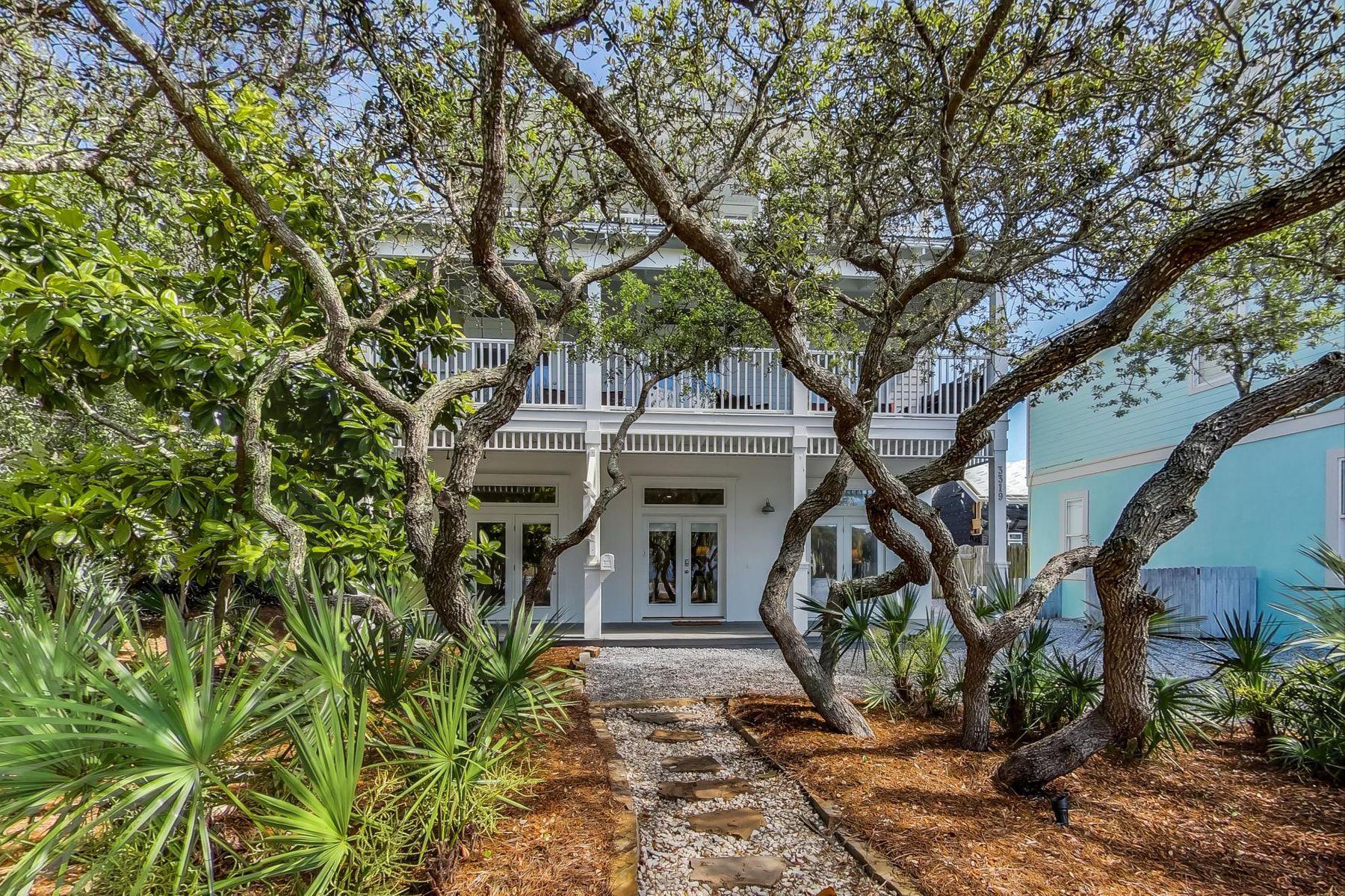 Under Contract - Accepting Back-Up Offers. Positioned among the mature trees of Seagrove Beach, ''Utopian Village'' offers a prime location right on Scenic Highway 30A just across the street from a convenient beach access. Offered completely renovated, professionally decorated and fully furnished, the perfect second home or rental investment property awaits. This three story home boasts six bedrooms, four bathrooms, a private pool, gulf views and expansive outdoor living spaces. On the first floor, you will find a spacious master suite with arched doorways, a walk-in closet, a master bathroom with a double vanity and private access to the pool. Adjacent are two guest bedrooms with a shared bathroom.  The heart of this home is on the second floor with a chef's kitchen offering new cabinetry and appliances, a gas range and quartz countertops. The kitchen flows into the open dining and living area. Natural light streams in from the large covered porch. Adjacent to the living area are two additional guest bedrooms along with a shared bathroom. The third floor features a large bunk room, private bathroom and a covered porch. "Utopian Village" offers sleeping space for twenty people and is convenient to the beach access as well as the renowned shops and restaurants along Scenic Highway 30A.