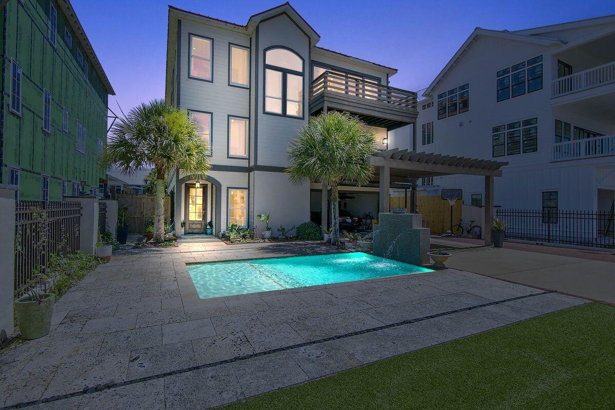 Set in a prime location on 30A just steps from beach access, this eight-bed, eight-bath gulf-view property offers a unique opportunity for the right buyer or investor. Built in 1996, it has excellent amenities including an elevator, 10-ft. ceilings, two kitchens and a private pool. Wedged between multimillion-dollar properties, it's not hard to envisage the incredible potential this beach house affords, especially as a lucrative vacation rental. The main entrance leads into a full kitchen, living area, three guest bedrooms and two full bathrooms. Ride the elevator to the second floor to appreciate the superb gulf views from the master suite with a private balcony. Three spare bedrooms, two full bathrooms and a laundry room take up the rest of this floor. The third floor has an open-concept living area with breathtaking gulf views. A fireplace, shiplap walls and built-in cabinetry enhance this awesome gathering space. The main kitchen has quartz countertops and stainless appliances. There's another guest bedroom and a bathroom with a sauna on this upper level. The fenced yard has easy-to-maintain artificial turf and a gorgeous coral stone patio that's already wired and plumbed for a summer kitchen. A covered terrace overlooks the saltwater pool and fountain. Additional features include a secure gated entrance and driveway parking for up to 14 cars. There's even a carport for two vehicles with a hook-up for charging an electric vehicle. This gulf-view beach house could be the perfect opportunity for a buyer with vision who's looking for a rewarding challenge.