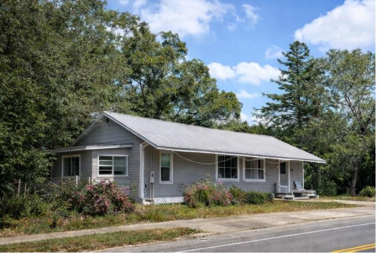 Great investment opportunity in the growing community of DeFuniak Springs This a historic 1930s single-family home offers strong potential for investors looking for a renovation, rental, or resale project. Situated on 1.18 acre residential lot in an established neighborhood, it provides a solid opportunity to add value and capitalize on the area's increasing demand for affordable housing.

Conveniently located near downtown DeFuniak Springs, shopping, schools, and local amenities, the property combines small-town charm with excellent investment potential. With the right vision and updates, this could become a profitable flip, long-term rental, or portfolio addition.