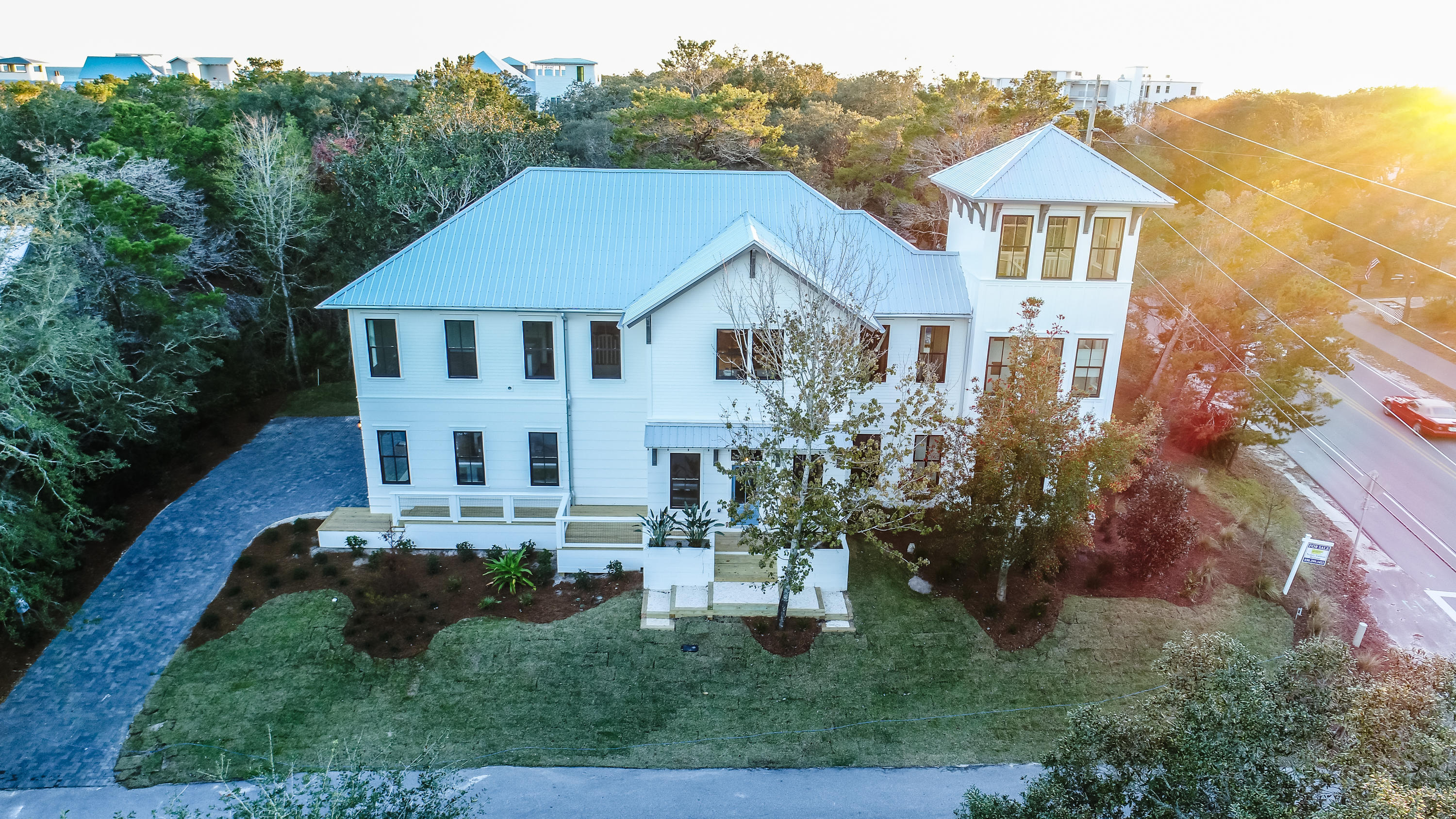 This elegant home is situated on one of the highest elevations in Seagrove. The 3 story tower adds majestic curb appeal in a coveted location. Fabulous rental potential only 2 blocks to the sugar sand beaches of 30A, with upscale dining and shopping. Home will be sold fully furnished and rental ready. This spacious home offers 5 bedrooms, plus bunk room, 2 large living rooms, gorgeous custom tile and cabinetry throughout. From the vaulted great room you look out on the sparkling waters of your own private pool with adjacent outdoor kitchen. Two master suites invite owners and guests to enjoy the luxury of this well appointed quality construction. A two car garage, golf cart parking, and generous enclosed outdoor storage maximize the convenience. No detail has been spared, including laundry rooms on both 1st and 2nd floors, as well as a game room.

Bonus: Large covered storage area underneath the second story pool. This street is highly desirable for its magnificent homes on large lots with no HOA, quiet location in the heart of Seagrove.
Cedar beams in great room, cedar and ship lap accents throughout home. Rental projection over $160,000!
One owner is a licensed FL real estate agent. **Buyer is responsible for personally verifying details about this property. Any information contained in this listing is believed to be correct but is not guaranteed.**