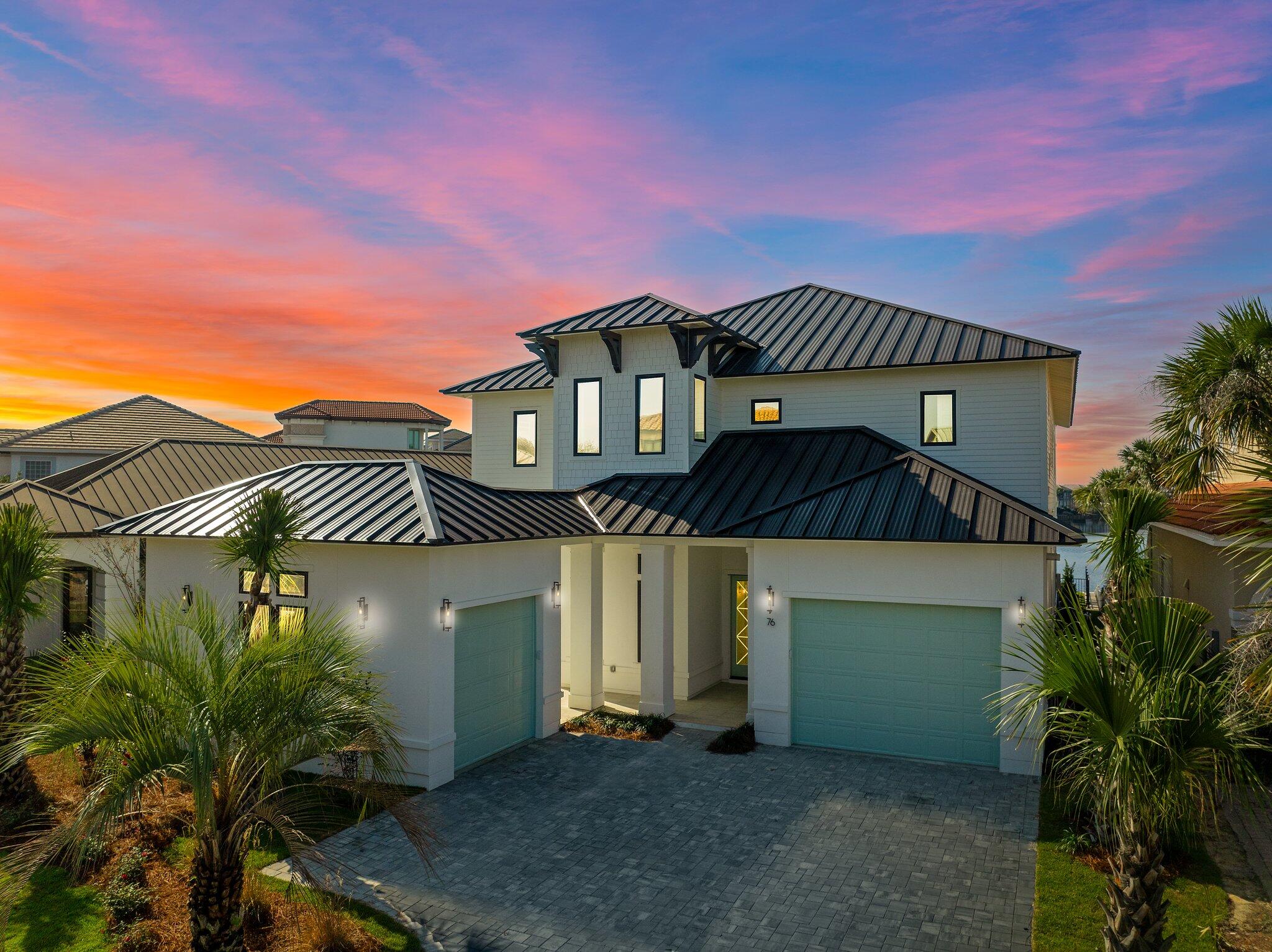 $200,000.00 Price Improvement! FULLY FURNISHED! Seller also placing the home on a rental program! 

This custom-built home offers a spacious 5-bedroom, 2-bunkroom layout with 6 full bathrooms and 2 half baths. Featuring two luxurious primary suites, one conveniently located on the first floor with a spa-inspired bathroom and a walk-in closet. Both primary suites boast access to expansive outdoor porches, perfect for relaxing and enjoying the beautiful surroundings.

Inside, you'll find exquisite white oak hardwood floors, granite countertops, and soft-close cabinetry throughout the home, providing a timeless appeal. The inviting living area includes a cozy gas fireplace and a wet bar, creating an ideal space for both relaxation and entertaining The chef-inspired kitchen is fully equipped with top-of-the-line Electrolux side-by-side refrigerator and freezer, dual dishwashers, a custom hood, and a Fornal 8-burner range/oven. For added convenience, the first-floor laundry room features two washers and dryers for maximum efficiency.

Entertain in style with the beautifully designed summer kitchen, complete with Nature Kast cabinetry, a gas grill, beverage cooler, and sink. The home's exterior is pre-wired for landscape lighting and features a space for a charming firepit in the front courtyard, perfect for evening gatherings.

Don't miss the opportunity to make this incredible property your own and experience luxury living in the highly sought-after Destiny East community! Projections for the home upwards of $200,000 a year. Please see the documents for relevant information.