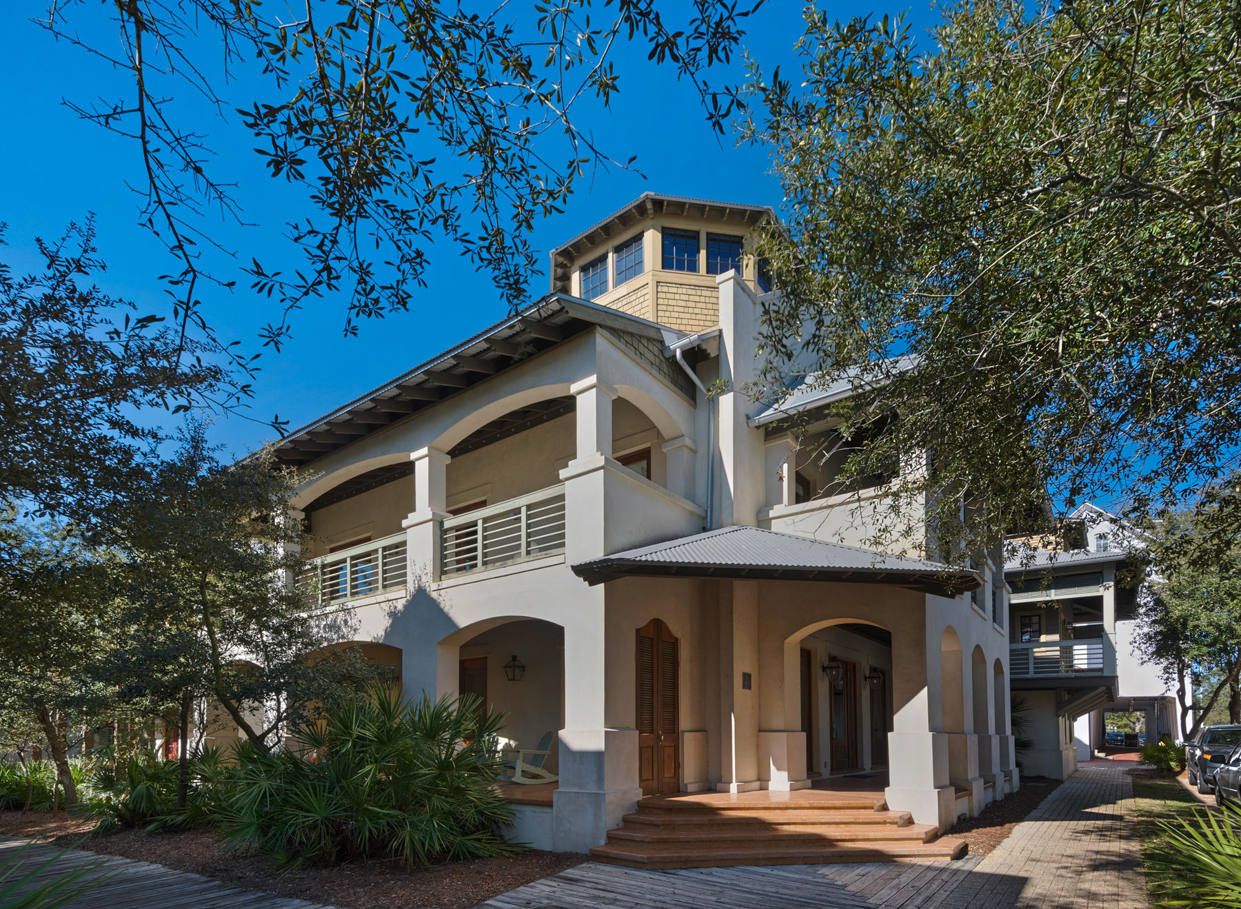 Starring all the preferences of Coastal Living - Gulf views, multiple porches and balconies and close proximity to the Beach & Rosemary Beach Town Center! The Main House Level 1 host 3 Guest Bedrooms with en suite Baths as well as a Guest Lounge area with Coffee bar. Level 2 enjoys the open Living/Dining Kitchen, an media room and wet bar. The Master Suite with coffee bar is on Level 3 then upward to Level 4 is the Tower with panoramic Gulf views. Walking out of the Main House and thru the walled Courtyard leads to the Carriage House. Level 1 is the 2 car garage, Level 2 & 3 are arranged as a Guest Apartment with a Living/dining/kitchen, bedroom, bath and lofted bedroom. When one walks out the front door, go south 2 blocks to the Beach and west 1 block to RMB Town Center!
