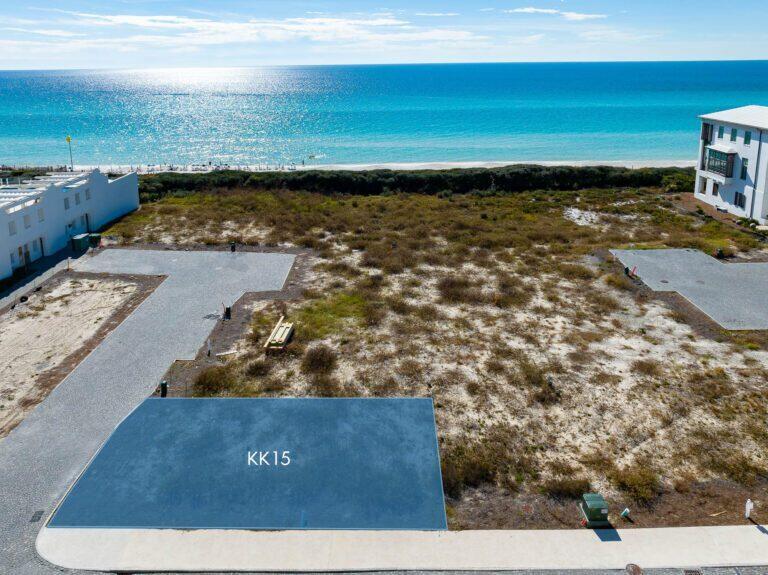 This incredible Gulf view homesite is now available for purchase in the famed KK Block of Alys Beach. Architect Gary Justiss has designed an architectural masterpiece, which will convey with the sale if desired (plans are attached). All plans have been fully approved, and construction can commence upon Buyer's readiness.  

Homesite KK15 is centrally located in the HEART of ALYS BEACH.  Conveniently situated between the private owner's Beach Club and the Gulf Green, this premier bookend homesite fronts Sea Garden Street, corners the Sea Garden Walk Pedestrian Path and provides direct access to the beach from your front door.

Homesite KK15 allows for a 3 story custom home as well as a 4th story roof terrace that can accommodate a roof top pool & summer kitchen if desired.  Cherish forever views of the Gulf of Mexico from inside and out on the 2nd, 3rd and 4th levels. The plan provides for private guest quarters (architectural designs are drawn for both a 2BR or 3BR 1st level- buyers choice) with a separate entrance, full kitchen, laundry and living area. This chic Gary Justiss design boasts 4BR/ 6BA , 3,947 SF of conditioned living space (or 5BR/6BA, 4,240 SF), an incredible open floor plan, 2 car garage, elevator, fireplace, butler's pantry, a roof top pool as well as a multitude of balconies and terraces throughout your home.  Along with an oversized guest suite on the 3rdlevel, the remainder of this floor is dedicated to a breathtaking primary suite with 270 degrees of incredible views, dual closets, a coffee nook as well as a private office and balcony overlooking the Gulf.

This corner condition homesite allows for an abundance of natural light giving way to incredible sight lines of the water and the architecture that has made Alys Beach the destination of destinations. The open and airy design is ideal for full-time living or large family gatherings. It's time to live life to the fullest, make family memories and enjoy all that Alys beach has to offer. This is an incredible purchase opportunity that will not last long.