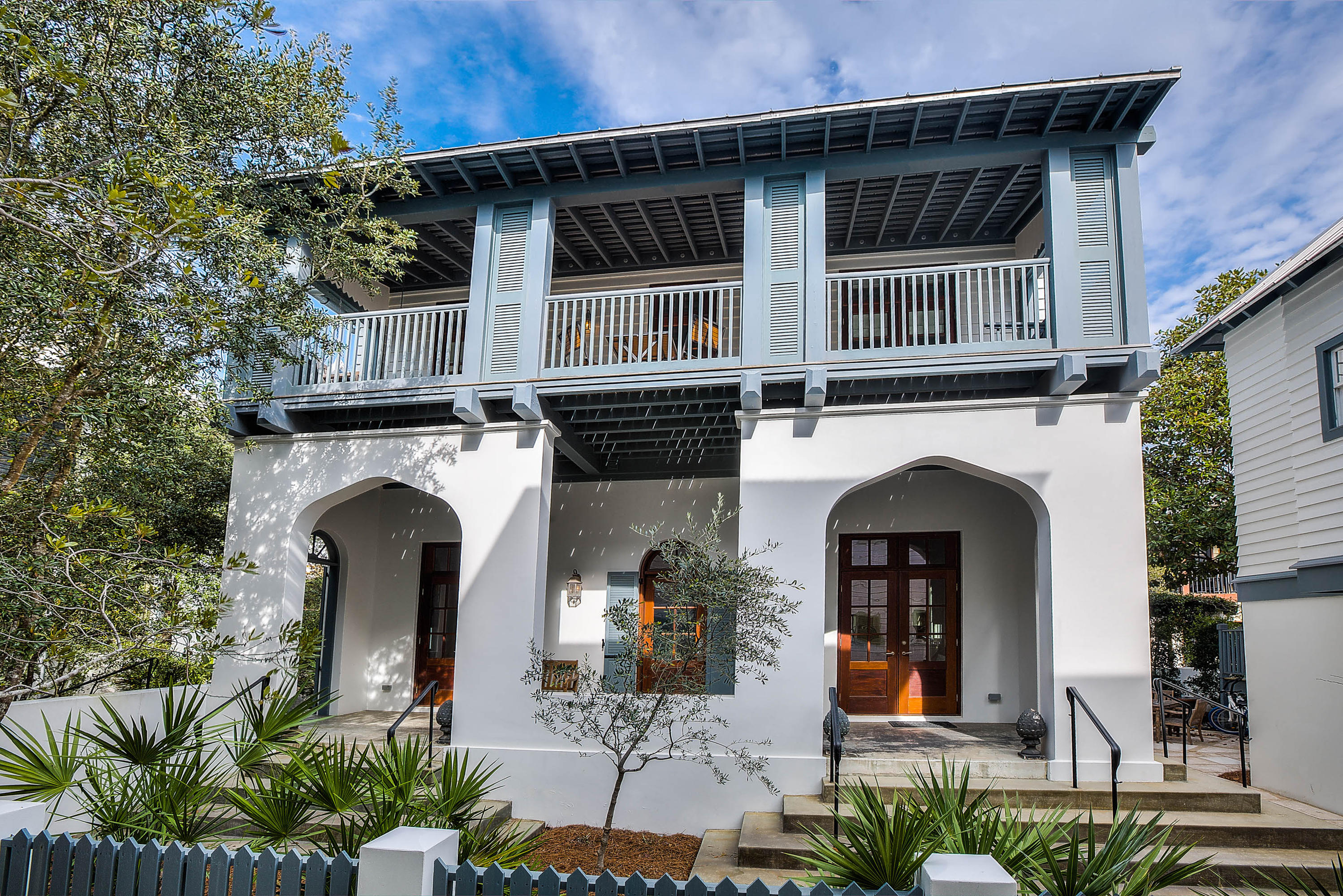 Move in ready - this beautifully furnished home is on the gulf side of Rosemary Beach. Just a few steps to the beach down a lovely tree shaded boardwalk. This Charleston style side yard home has a fireplace in the living room and one in the carriage house. Oak and tile floors, Mahogany french doors that open onto a lush landscaped yard with beautiful seating & eating area located under the canopy of a magnolia tree. The dining area boasts room for the whole family next to the kitchen with stone counter tops and stainless appliances. The Main house has 3 bedrooms 3 baths. Carriage house has loft bedroom and bath with additional 1/2 bath and bunk area. Porches galore on both homes. Location close not only to beach but center of town and all amenities. Click 'More' for other details Plans for the addition of a pool have been completed with the approval of the Rosemary Beach Town Architect and will convey with the sale of the real property. Information contained within this listing such as square footage, is deemed to be accurate but is not guaranteed. Buyer to verify.