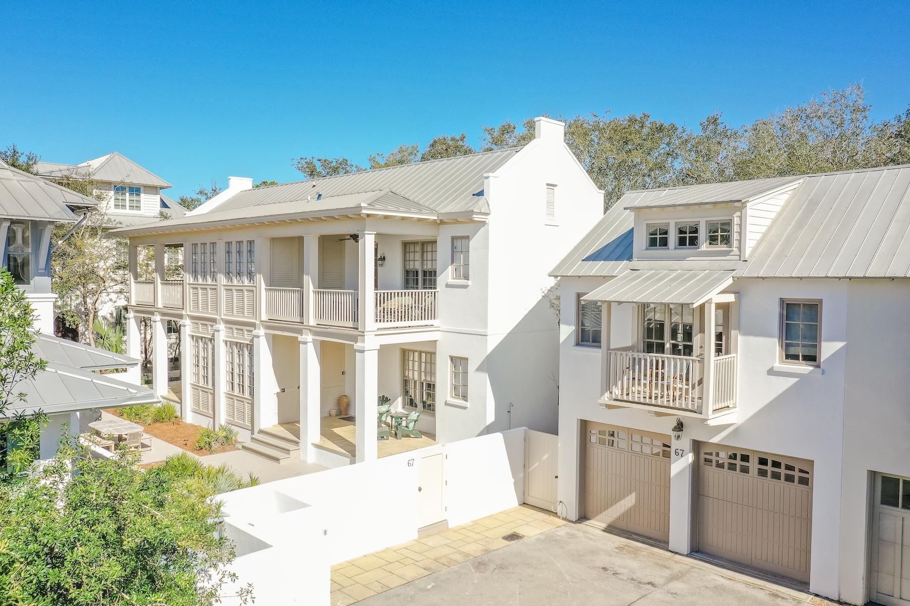 South of Scenic 30-A in the community of Rosemary Beach, this newly renovated Charleston courtyard home proudly sits on a quiet cul-de-sac. Protected by a white stucco perimeter wall, this wide parcel opens directly onto serene Boardwalk E.
Artfully designed by Looney Ricks Kiss, 67 Dunmore Town Lane is graced by majestic parapets and an abundance of private spacious porches. It offers a wonderfully crafted floor plan on two levels providing easy living for families and their guests. An abundance of large windows and spacious porches grace this stunning 5 bedroom, 5 1/2 bath that includes a separate carriage house residence.
Newly custom furnished in a Rustic Modern style with a coastal flair featuring clean lines of whites, grays, and beiges. The lot size will most likely qualify for a pool per town architect.