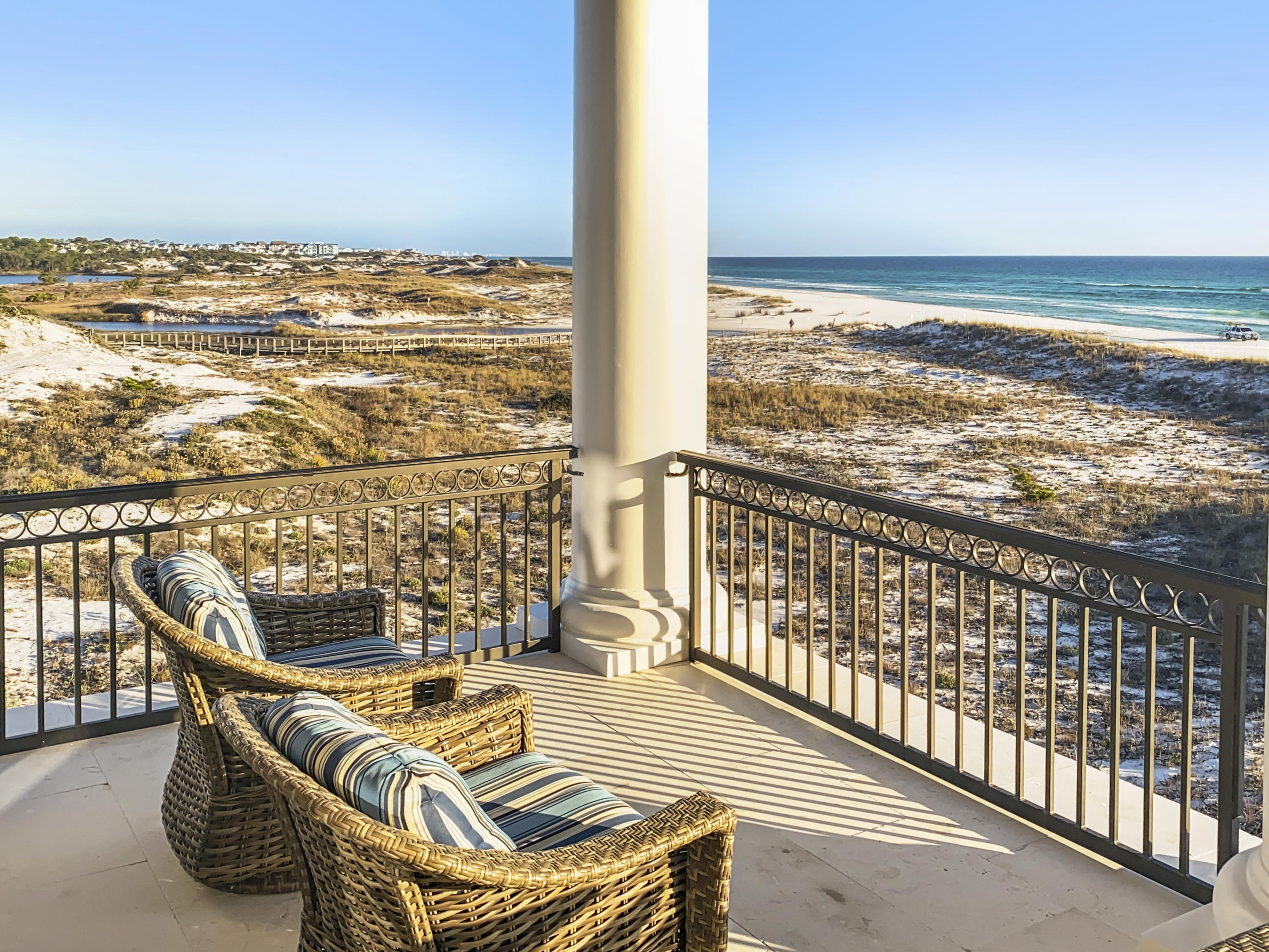 Graced with an impressive provenance and located just minutes from Alys & Rosemary Beach, this grandly proportioned beachfront villa is a stunning blend of architecture and craftsmen. A private family compound of the finest caliber, the home overlooks Deer Lake State Park, as well as the Gulf of Mexico.
This rental-ready coastal residence includes endless views, with 51 feet of Gulf frontage, over 4200 square feet, 5 spacious bedrooms & 4.5 bathrooms. Unparalleled coastal lifestyle with a lavish beachfront pool terrace, multiple fire features & swim-up poolside bar is among the many amenities. Designed for entertaining and fine living, its interiors are filled with exceptional appointments such as vaulted ceilings, custom beamed ceiling, hardwood flooring, 10-foot ceilings, and gas fireplace.
The first floor offers Gulf-front guests suites, each with private baths and opens to the incredible private pool overlooking the emerald waters.  Designed to fully embrace the coastal lifestyle, the oversized terrace and pool area is the ideal backdrop for a cocktail party or family event under a sea of stars and enjoying the music of the waves beyond the dunes.
 
Take the elevator to the second story an open concept living area, where guests will immediately be drawn to wall of windows offering panoramic views of the Gulf. A chef's kitchen with custom cabinetry boasting antique mirrored glass & hardwood, granite countertops and oversized breakfast bar offer Instagram-worthy views of Deer Lake State Parks dunes as they race towards the Gulf. Two additional guest suites with private baths and laundry room complete this level.
 
The master retreat occupies the entire top level of the home offers a private sitting area, fireplace and rapturing views of the water from the private terrace and en-suite spa-like bathroom with soaking tub, walk-in shower and dual vanities. A morning kitchen, workout room and additional laundry top of this private retreat, accessible by elevator.
 
Tucked away in the privacy of Deer Lake Dunes, this distinctive Gulf-front property is convenient to the 30A lifestyle, the award-winning restaurants of Seaside and Rosemary, shopping and family fun at the HUB on 30A,  and events and music of Gulf Place and Alys Beach, all while affording a serene coastal lifestyle to retire to each night.