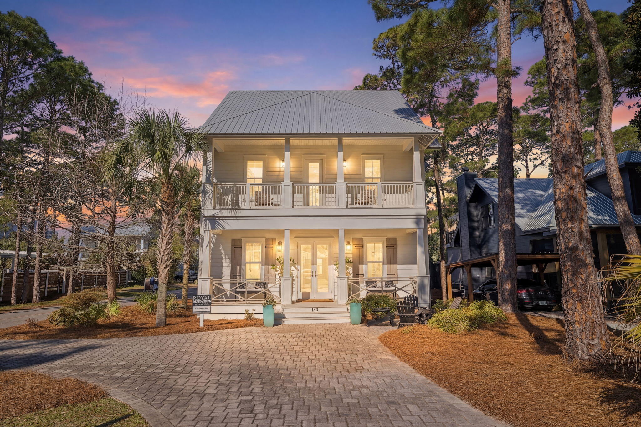 Beautifully updated through an extensive remodel, this Grayton Beach home offers a bright, clean, move in ready feel throughout. Featuring a fully redesigned kitchen, new appliances, updated furnishings, and thoughtful upgrades, the home delivers a cohesive and inviting living experience from the moment you walk in. Offering five bedrooms, a bunk room, and a separate flex living area, the layout is ideal for both full-time living and rental flexibility. Two spacious living areas provide ample room to gather and entertain, while the additional lounge space offers the perfect setup for a media room, kids' hangout, or quiet retreat. The convenience of both primary and second-floor laundry adds everyday ease. The updated interiors carry seamlessly into the outdoor living spaces, where multiple porches invite relaxed mornings and evenings. A fenced private yard and heated pool create a true backyard retreat, perfect for enjoying the 30A lifestyle. Situated on a large corner lot with a one-car garage and ample parking, this home is just a short walk to the beach and moments from Grayton Beach's iconic restaurants, shops, and local favorites.