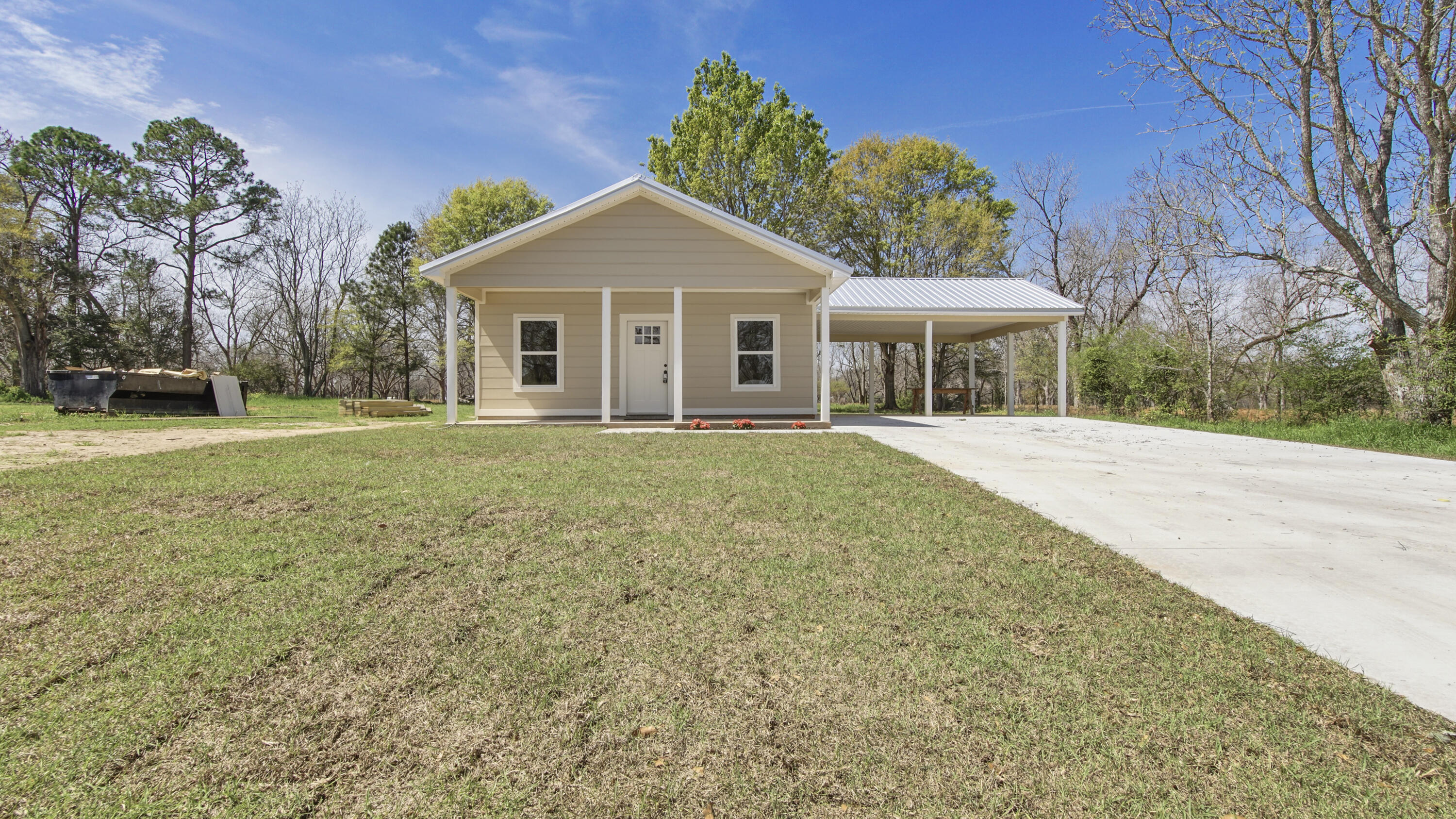HOME IS COMPLETE Why pay rent when you can own? NEW construction open concept floor plan offering a move in ready opportunity located in Lockhart AL! Home features 2 primary bedrooms, each with spacious bathrooms that provide ample space. The property offers great outdoor space for gardening, entertaining, or just enjoying the peace and quiet. Home has a large open concept with living, dining, and kitchen combo, that is perfect for entertaining. This cozy-built home offers a great floor plan with a perfect master suite on the rear of the home for your privacy. Home has a great covered front porch as well as a large 2 car attached carport. Located just over the Alabama state line means you'll save on property taxes and homeowner's insurance reducing your house payment so you can afford more