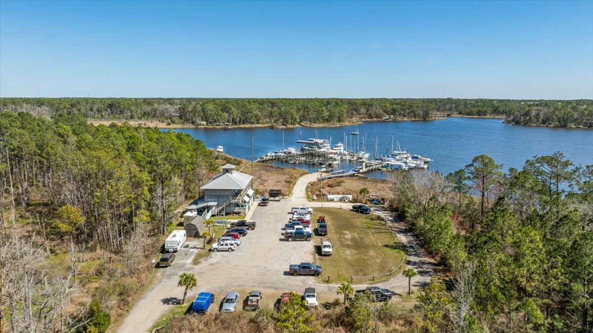 Freeport Marina at Marina Village and Premier Waterfront Opportunity in Freeport, Florida
20.66 Acres Total. Seize the chance to own Freeport Marina, a distinguished full-service marina nestled on LaGrange Bayou in Freeport, Florida. This exceptional property offers a blend of marina services making it a focal point for boating enthusiasts and residents alike. Marina enjoys direct access to the Choctawhatchee Bay, providing seamless navigation to the Gulf of Mexico. 
Village Marina represents a unique investment opportunity, combining steady revenue streams from marina operations and restaurant lease with the potential for future development on the accompanying land. See due diligence report for the 17 acres at Destinluxury.com/lagrangebayou 

Note income and expenses under the documents tab.