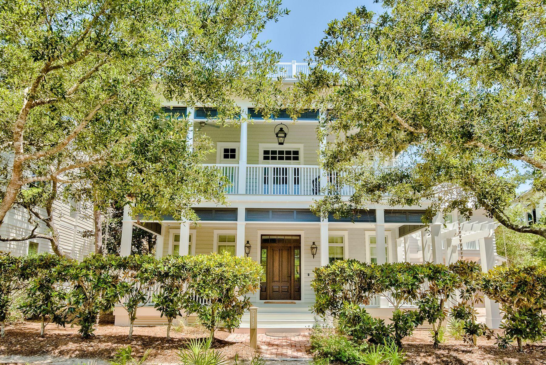 Renovated and better than new, this custom home and carriage house promise a quiet WaterColor lifestyle surrounded by the very best amenities. Originally designed by TS Adams, this three-story Southern-style home with its covered porches is topped by a spacious lookout for toasting endless vermilion sunsets. Set in a coveted location bordering the iconic Western Lake, this Phase 1 residence was given a complete makeover in 2018. The result is a state-of-the-art home with high-end finishes and custom features at every turn. Beneath the new roof, you'll find new white oak flooring, solid poplar doors, pine nickel gap walls, custom cabinetry and the latest lighting and plumbing innovations. The new HVAC even extends into the garage storage room. This magnificently presented home includes over $100k in custom window treatments alone. Open the solid Mahogany front door and step through the grand entrance flanked by flickering Bevolo gas lanterns and take in the spacious layout. Venetian plaster and immaculate Ipe wood flooring add a tangible sense of depth and character. Appreciate the sinker cypress ceilings in the master sitting area and dining room, salvaged from the Choctawhatchee River. The kitchen combines attractive design features with practicality. High-end Wolf appliances allow you to conjure up quick snacks or elaborate feasts when entertaining. The butler's pantry keeps everything orderly yet discreetly out of sight. The second-floor living area and full-width porch enjoy serene treetop views. The third floor offers an additional living space with lake views situated between two additional flex rooms and full bathroom allowing for flexible sleeping options. Climb the custom-designed staircase to the rooftop lookout and breezy catwalk with breathtaking views of both the Gulf of Mexico and Western Lake. The rear of the house provides ample outdoor entertaining space with peacock pavers, a gas fire pit and fountain feature. There is a two-car garage and guest house, still leaving ample space for a large pool. Close to the exclusive Beach Club, the location is unrivaled, just a hop from the community pool for swimming and lounging. Linger over cocktails and stay for dinner at the renowned Beach Club with multiple options for dining or stroll along the boardwalk to the white sandy beach. The nearby Boat House is stocked with paddle boards, kayaks and fishing rods for you to try out some new water sports. It's all part of the WaterColor lifestyle.