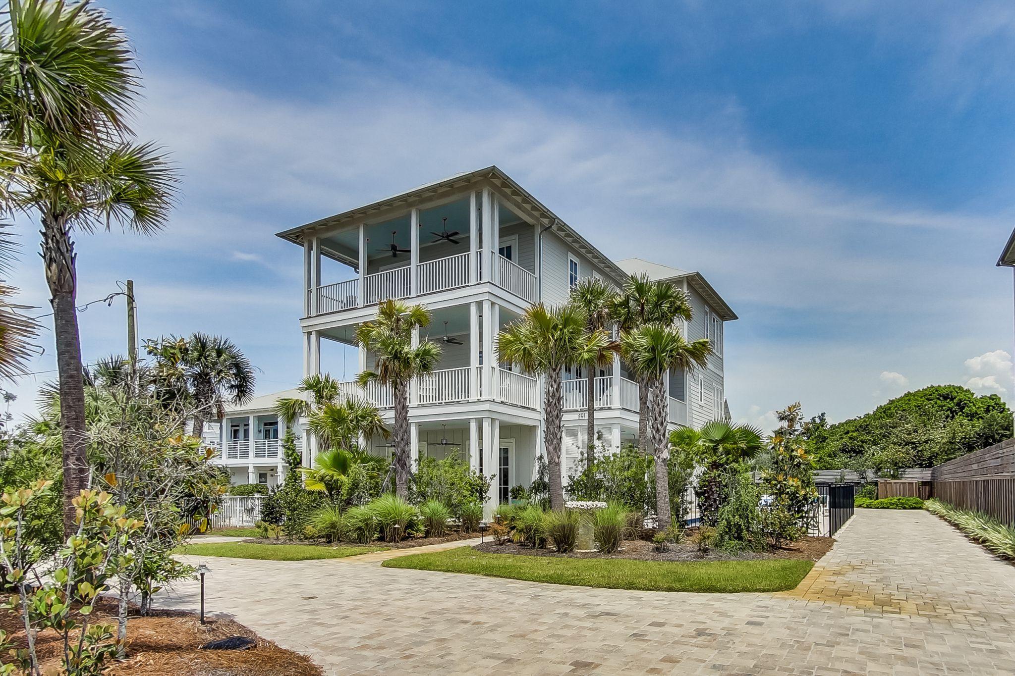 Welcome to Meant to Sea at 401 Blue Mountain Road in Blue Mountain Beach a fabulous, fully furnished home with a pool, for a large family, just steps to the beach! Three living rooms provide plenty of social gathering space and 5 porches allow you to take the fun outside for fantastic views of the Gulf of Mexico. This 4524sf home features 6 bedrooms and 6 -1/2 baths and comfortably sleeps 19 people with lots of privacy on 3 floors, all of which are serviced by an elevator. Swim year round! There's a heated pool and plenty of room to park 7 vehicles in the driveway, plus a 1.5 car climate-controlled garage. All 3 floors have 10ft ceilings and the first floor has pecky cypress ceilings adding southern, casual flair. On the first floor, you'll love the huge recreation room with 3 sets of French doors opening to the pool. The second floor is the main living area with open kitchen, dining and living areas as well as a powder room for guests.  The kitchen is gorgeous with designer cabinets, marble countertops, stainless appliances, induction oven (which could be converted to gas) and wine fridge.  The living and dining areas are spacious and both open to porches with stunning views. The second floor master suite includes an office, a sitting area and a fabulous bath with a soaking tub, separate shower and walk in closet. An inviting sitting room greets you as you arrive on the 3rd floor.  A lovely bedroom with en-suite bath is at the back of the home as well as a bunk room with a cute hobby room.  The 3rd floor master with sitting area has breathtaking views!  This master bath has separate sinks and a shower. The master bedroom's wide balcony captures the salt air breezes as you greet the new day in the morning or unwind at sunset in the evening.   We invite you to enjoy the very best in coastal living at Meant to Sea!