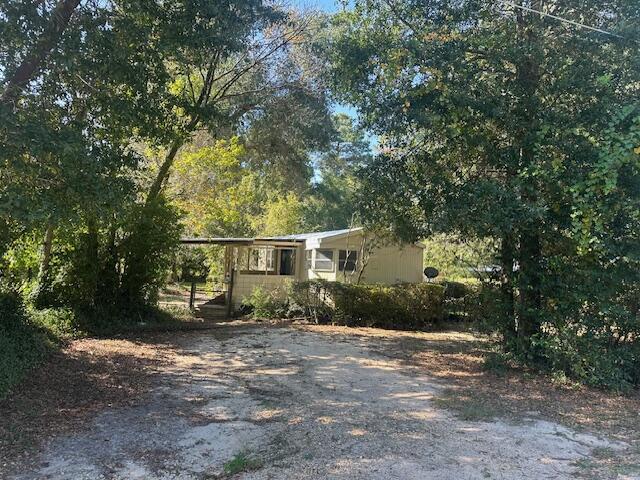 ***OPPORTUNITY*** Back on the market at no fault of the seller. Are you looking for affordable living in Walton County?  Here is the answer you're looking for. This older mobile home has been remodeled by the owner and is move in ready. The home sits on just under 1/4 acre in the Oakwood Hills area. The home is a two-bedroom, one bath, with a bonus room that could easily be transitioned into a nice sized bedroom. The owner had this property as a rental property for years and with no issues with finding renters. The best thing about this property, it is listed UNDER $100K. That is unheard of for Walton County property nowadays. BEST THING ABOUT THIS PROPERTY IS OWNER FINANCING IS AVAILABLE with approved terms. So, whether you are looking for an investment property or looking for your own little slice of Florida, come check this property out!