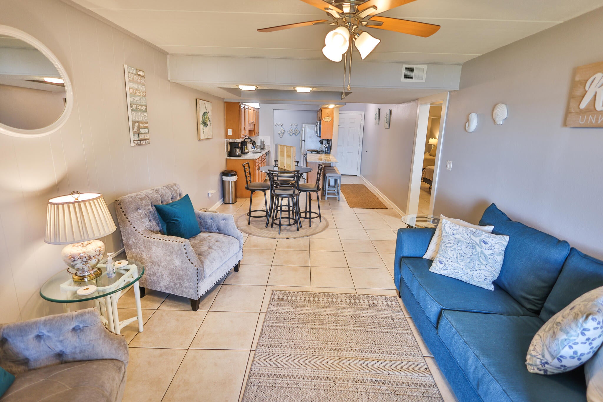 This Fully Furnished condo features two beautifully renovated bedrooms and one updated full bathroom. Three smart TVs, one in the living room and one in each bedroom.
Elegant interior with granite counters, new appliances, and updated bathroom. Open concept fully stocked kitchen perfect for family gatherings.
Just steps away from the waterfront, pool, and fishing dock. Private patio view overlooking the sound, providing a tranquil retreat.
Free WIFI available throughout the condo.
* Bedroom 1: King bed, TV, dresser, closet, and fan.
* Bedroom 2: Double bed, TV, dresser, and closet, fan.
* Kitchen Amenities: Fully equipped kitchen with dishes, pots, pans, silverware, and coffee maker.
Spacious bathroom (bath towels provided).
Smart lock access with a unique door code. Utilities Inc