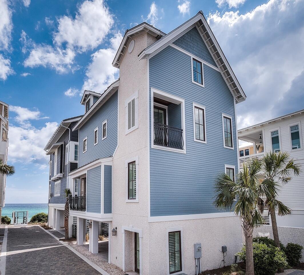 Welcome to 244 Winston Lane - Exquisitely located near the Gulf in Inlet Beach, this property is designed with a luxurious 30A lifestyle in mind. As you enter the driveway to the residence, you are greeted by a view of the Gulf just outside the private beach access for the Bluffs at Inlet Beach neighborhood. Offering covered parking & a reserved parking spot outside, the ease of access to this property is magnificent. You are greeted by a foyer, perfect for tossing off your flip flops. And upstairs resides a masterful kitchen with gorgeous white marble countertops & plenty of bar-seating. The living space is furnished perfectly with elegance at heart. Just off the formal dining area is a private balcony, perfect for unwinding and taking in a view of the Gulf. On the second floor, you also have a lovely powder bath. Moving to the third floor you have two guest bedrooms each with their own en-suite bath. The first is a great guest bedroom with a queen bed for the adults. And across the hall is a wonderfully-designed bunk room with custom twin over twin & twin over queen built-in bunks. The primary suite is located on the top floor to feature its monstrous Gulf views just off the private balcony. The primary bathroom is open & luxurious with a jetted tub & walk-in shower. The primary also has a kitchenette tucked away for the ultimate privacy. Exiting the property, the Bluffs at Inlet Beach gulf-front community pool is just a short walk away where you are also offered an additional boardwalk down to the private beach. There is no better place to call home.