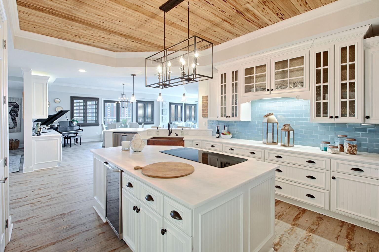 Renovated Corner PENTHOUSE features expansive views of the Gulf, East Pass, Destin Harbor, Crab Island, Choctawhatchee Bay, & the tree top canopies of Destin. This stunning waterfront condo  offers 4 bedroom with 4 ensuite bathrooms. One of the bedrooms has been converted into a cozy den. This unit has 2 balconies that wrap around and offer abundant space for entertaining, watching wildlife, gardening & the most spectacular sunsets. Renovations include beautiful honed marble kitchen counters, water heater,  shiplap, pecks cypress ceilings, new flooring, paint, & cabinets, surround sound, outside speakers and separate storage locker & 2 dedicated covered parking spaces. There is also a Marina on site

Walk to restaurants, bars