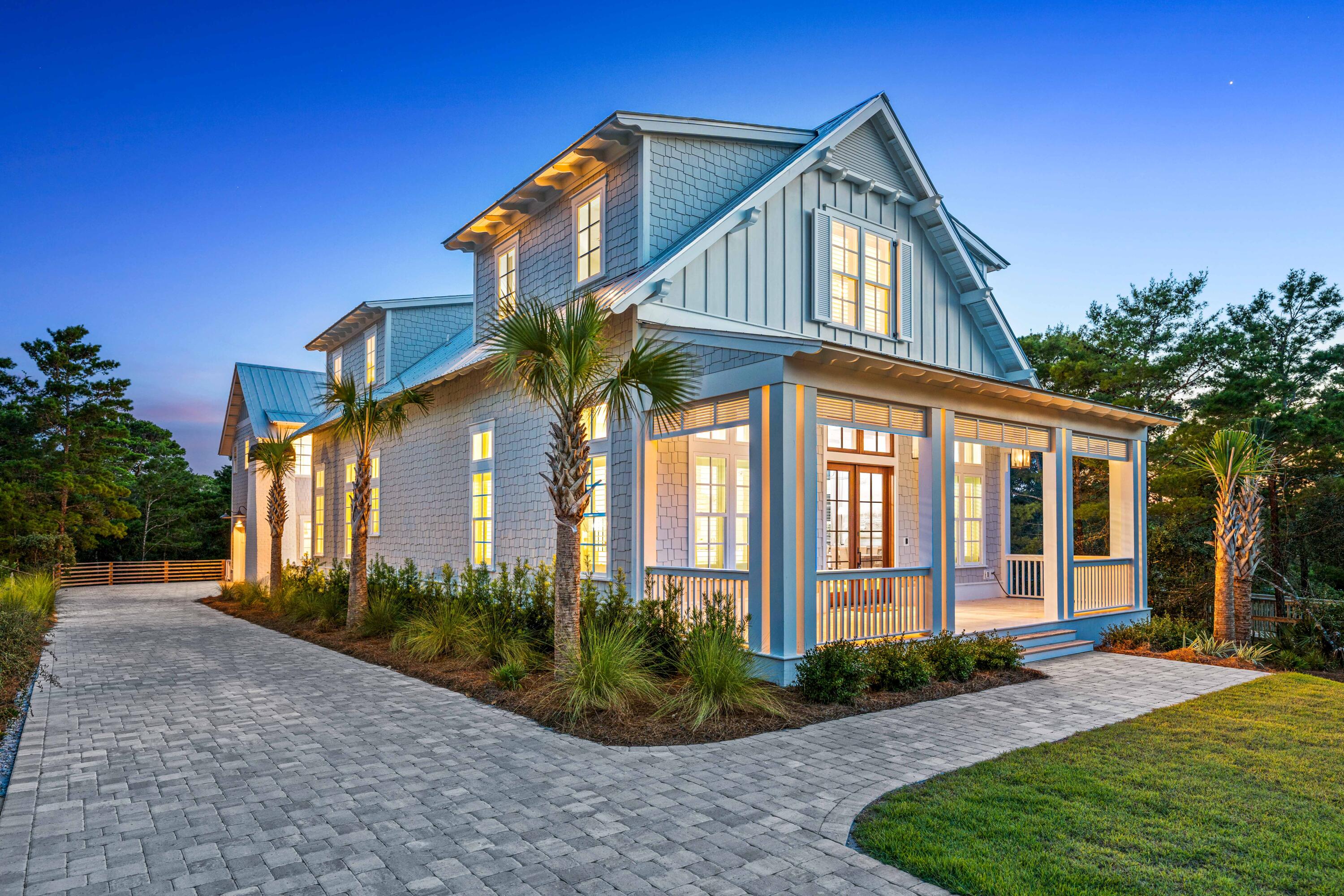 Welcome to 87 Sky High Dune Dr, a masterpiece of luxury living nestled in the heart of Blue Mountain Beach, FL. This newly constructed 5-bedroom, 5.5-bathroom estate spans 3,586 square feet and is the epitome of coastal elegance. Custom-built in 2024 by the renowned Borges Brooks Builders and exquisitely designed by Katie Grace Designs, every detail in this home exudes sophistication and charm.

As you step inside, you're greeted by stunning herringbone-patterned wood floors and beautiful custom tile and woodwork throughout. The open-concept living space is bathed in natural light, highlighting the gorgeous chandeliers, sconces, and high-end cabinetry throughout this home. 

The gourmet kitchen is a culinary masterpiece, featuring top-of-the-line appliances, custom cabinetry... and exquisite finishes.

Outside, enjoy the serene ambiance of your private oasis with a heated pool, spa, gas fireplace and a summer kitchen, all situated on a generous .33-acre lot. 

The front porch is adorned with charming gas lanterns, adding a touch of timeless elegance. The property also features separate living quarters in the carriage house, providing an ideal space for guests or extended family.

For your convenience, the home includes a 2-car garage, ample parking, and a laundry room with double sets of washers and dryers. The loft area, with its custom built-in beds, provides extra space for relaxation or hosting guests. In the master suite, unwind in the luxurious bathroom, featuring a private sauna and steam shower for the ultimate spa-like experience.

Located just a 2-3 minute golf cart ride from the beach, you'll have easy access to the pristine shores of Blue Mountain Beach and popular local spots like Blue Mountain Beach Creamery, Cowgirl Kitchen, and Redfish Taco within walking distance. 

This home is not just a place to live but a lifestyle to experience. Welcome to your dream coastal retreat at 87 Sky High Dune Dr.