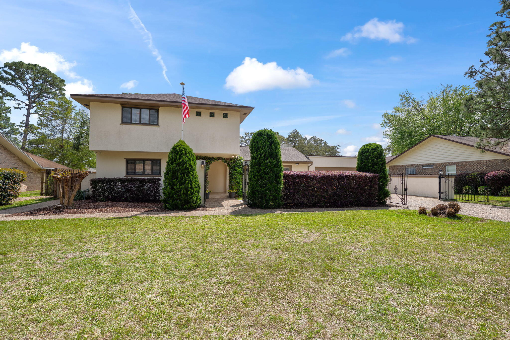 Private Mediterranean villa meets elevated luxury in this 5BR, 3BA home within Shalimar's highly sought-after Lake Lorraine Estates. The crown jewel: a backyard oasis complete with golf course views, Florida room, pool, hot tub, and large grass area—all to be enjoyed from the master suite's private balcony, a part of a brand new custom deck. Step inside to a window-to-wall recent renovation with vaulted ceilings, exposed wood beams, upgraded modern bathrooms, devoted laundry room / pantry, and custom chef's kitchen, plus fresh paint and upstairs carpet as of March 2025. Just 7 minutes from Eglin AFB, 18 minutes from Hurlburt Field, and 16 minutes from the Emerald Coast's white sandy beaches. NOTE: assumable 2.75% for military buyers! Contact listing agent for specifics!