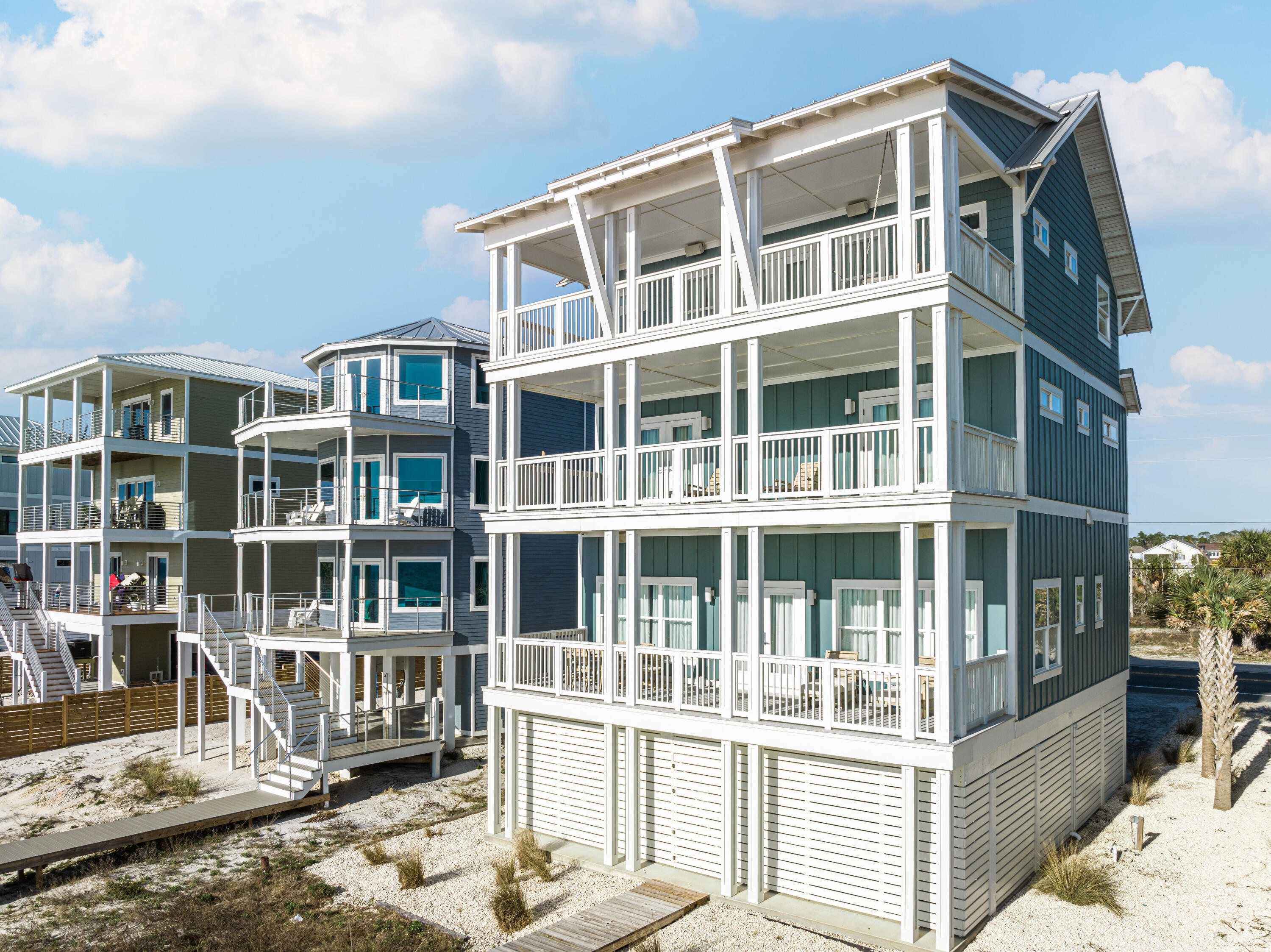 UNDER CONTRACT ~ TAKING BACK UPS! 
This is undoubtedly one of the nicest houses you'll find from Mexico Beach to St. Joe Beach. Everything in this home is custom and top of the line. The high-end finishes start in the foyer with high-end dirty top pine floors and well-appointed elevator and are found from top to bottom with no expenses spared. You'll find Wolf appliances, marble countertops, designer lighting, Restoration Hardware furnishings and much more. The entire 4th floor is a master bedroom with a sitting area and bath that's to die for with marble floors, soaking tub, huge closet, double tiled shower and more. Each floor has a large deck overlooking the Gulf. All bedrooms have en suite bathrooms and this home is being sold fully furnished  and equipped with a small list of exclusions. Check out virtual tour!