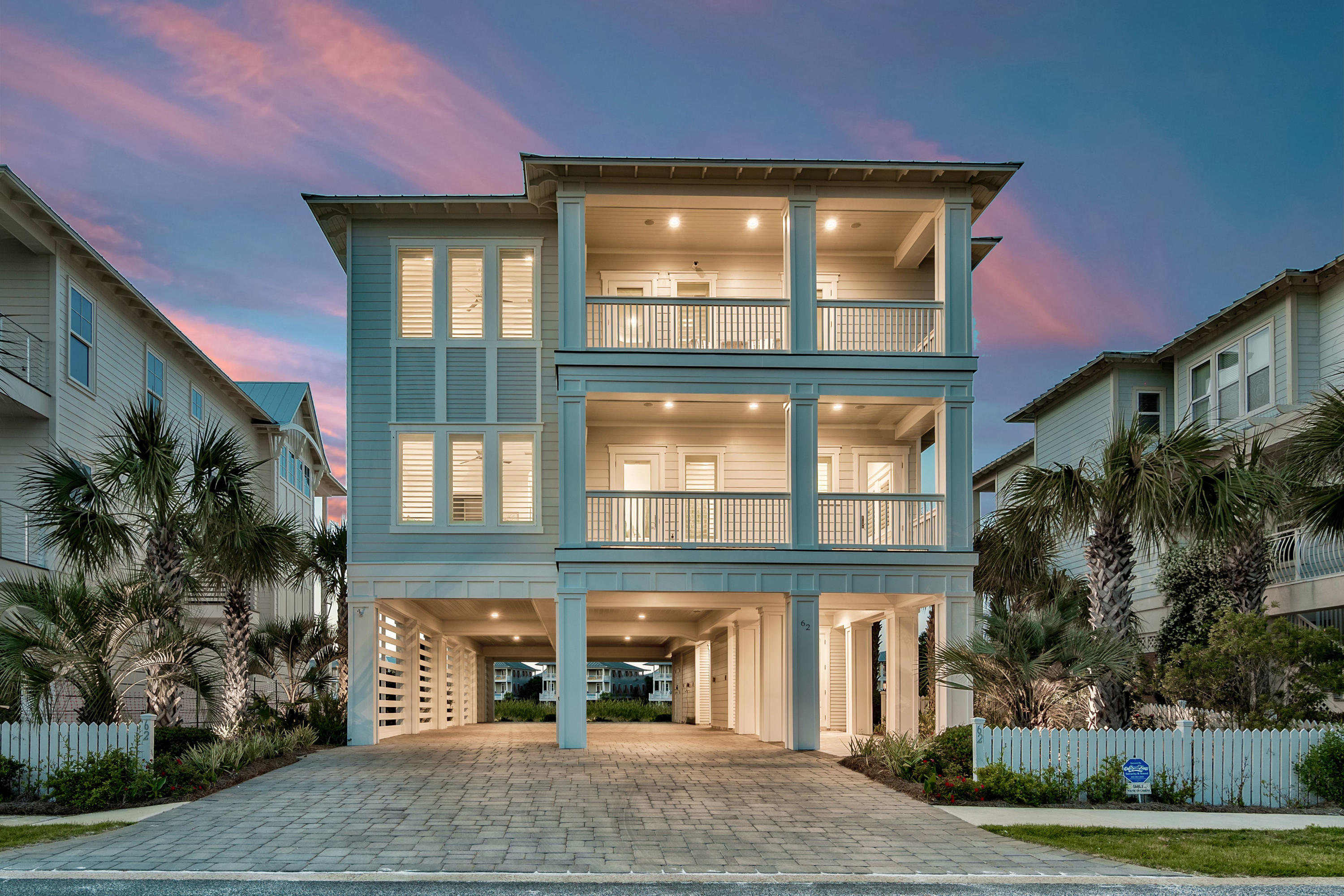 Better than Gulf front with all this upscale home has to offer, but at a fraction of the per square foot costs! An exceptional value on this outstanding, custom beachside retreat features unparalleled panoramic views of the Gulf of Mexico, East Pass and Coastal Dune Lake ideally located in the gated community of Destin Pointe directly adjacent to 3,000' of private beach frontage. Adorned in shiplap and draping in coastal contemporary design this luxe residence offers a plethora of upgrades including notable features such as a private elevator, interior and exterior camera system as well as smart home technology allowing full remote control from your smartphone or tablet. Masterfully designed to exude 30A style craftsmanship & charm, this property features an open floor plan complete with a chef's kitchen finely appointed with stainless steel appliances including a 6 burner gas cook-top double ovens & two refrigerators. The spacious living room is dually appointed with a built-in wet bar, gas fireplace, as well as a multitude of windows that perfectly frame the incredible gulf, lake & east pass views. The outdoor built-in summer kitchen is located on the second story deck which spans 12' in width and features a 36" gas grill as well as a big green egg & built & preparation space with a stainless sink. Other notable features include a queen over queen pinterest style bunk room, parking for 8+ vehicles, ample heated & cooled owner's storage, expansive master suite with foyer entry, tongue and groove wood plan ceiling, spa-like master bathroom overlooking the nature-scape complete with a large walk in shower, dual vanities & large walk-in closet. Exceptional rental opportunity with gross annual rental projections exceeding $180,000. Destin Pointe is an exclusive guard gated community in the heart of Destin with 24 hour security, two pool areas, hot tub, tennis courts, shuffle board, beach trolley (in seasonal months) as well as 3,000' of private deeded beach access. This property is a must see to fully appreciate the quality and craftsmanship. No detail was overlooked in the design of this highly desirable beach home. It truly offers all the features desired for those that aspire for the best in style and comfort in beach living.