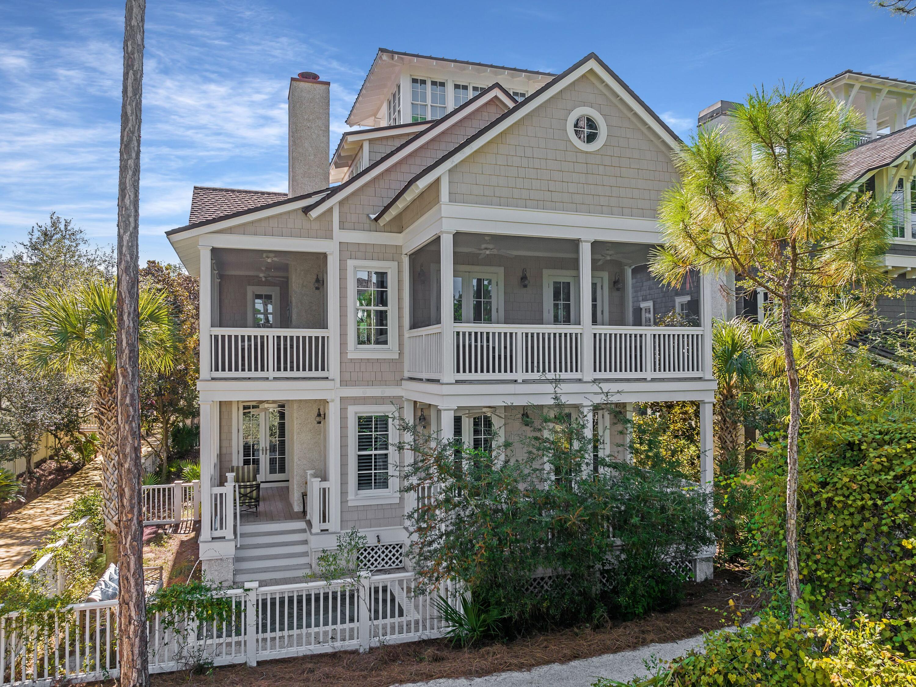 This stunning custom-built property is in the exclusive gulf-front community of WaterSound. Four floors of luxury living culminate in the lookout tower, the perfect space for enjoying panoramic gulf views at sunset. Those who enjoy entertaining will appreciate the multiple screened porches offered on all levels of this fully furnished home. As well as a Jacuzzi pool, this luxury residence has a  separate carriage house above a two-car garage. Heart-of-pine flooring and shiplap ground the home with its natural surroundings while exterior cladding adds to the distinctive architectural detail. The main floor master features a capacious walk-in closet and a luxurious ensuite with dual vanities and a tiled shower. A comfortably furnished rear porch leads down to the heated pool overlooking Yacht Pond. There's also a bunk room on this level. 

The second floor is designed for entertaining. The spacious family room is beautifully appointed with floor-to-ceiling small-pane windows, a cozy feature fireplace and French doors extending the living space onto two screened porches. The formal dining area is perfect for entertaining while the island accommodates seats for casual dining on a smaller scale. The gourmet kitchen makes cooking a joy with a farmhouse sink, Wolf gas range and Sub-Zero appliances including an ice maker. The third-floor loft includes an additional sitting/living area with vaulted ceilings and built-in desk. 

Accessed from a catwalk, guests will appreciate having their own carriage house accommodation with soaring ceilings, a large kitchen, ensuite bathroom, sun deck and porch for quiet contemplation. Suitable for a family or investor, this beautiful WaterSound home has never been rented and is exquisitely furnished. The wider community has outstanding amenities including four pools, a beach club, boardwalks for walking and bicycling, pocket parks and deeded beach access to the pristine white sand and emerald waters of the Gulf of Mexico. 

All measurements and fees deemed to accurate but buyer should validate.