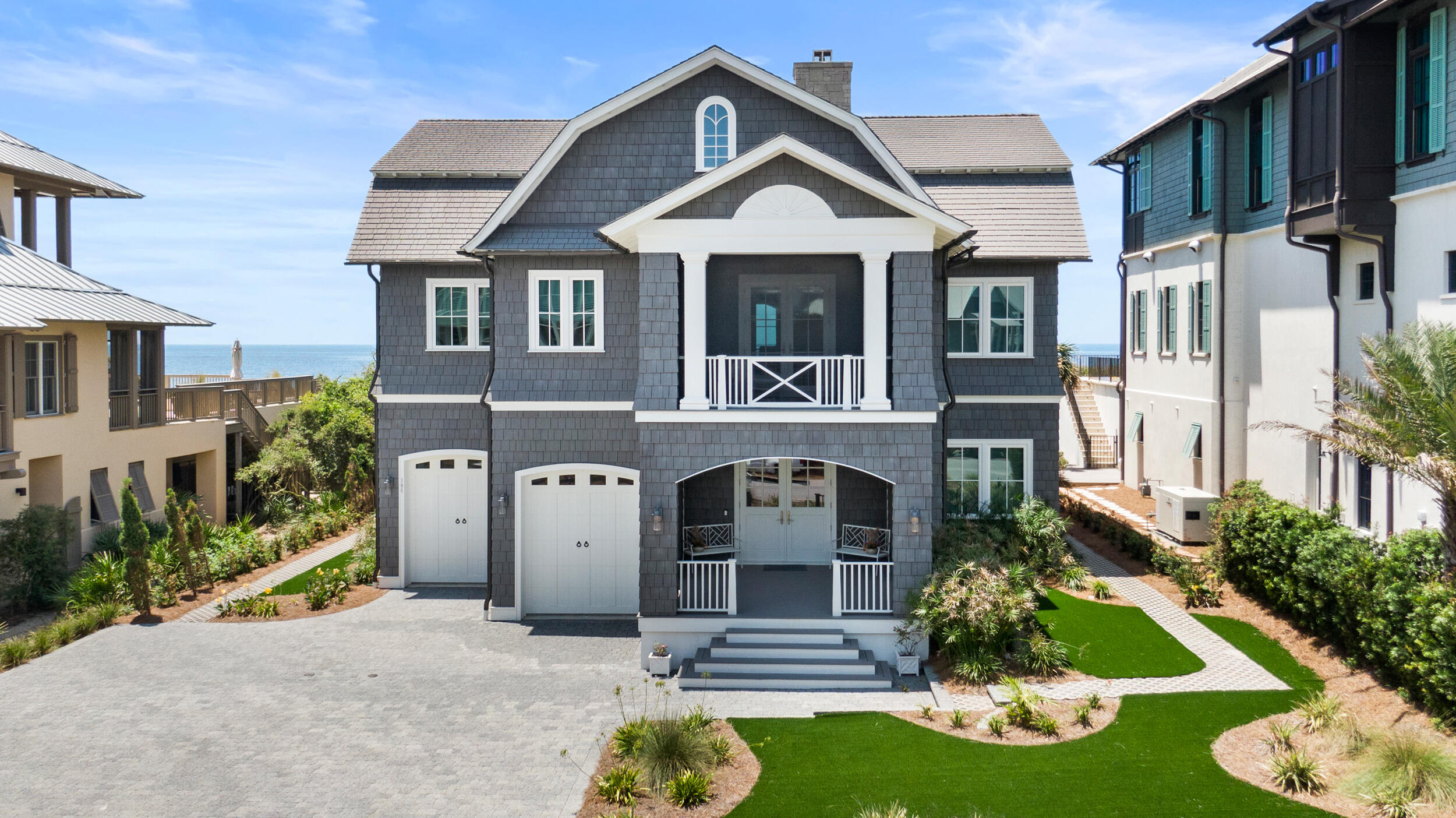 With every facet, this beach front gem is a lesson in detail and design integrity. This fully furnished Nantucket Cape-style home is the bespoke epitome of 30/A comfort and luxury. Perched on a bluff of enviable white sands in the charming pocket neighborhood of Camp Creek Point, this 4 bedroom, 4.5 bath beach front dream-home is nestled perfectly at end of a cul-de-sac just steps to one of Florida's rarest and most beautiful dune ecosystems, Camp Creek lake. Constructed from the finest materials, TS Adams Studio Design Architecture's attention to thoughtful detail in both, the living space and the exterior of the home goes beyond function; it exudes the perfect combination of sophistication, practicality and comfort. Case in point: the exterior is comprised of Enviroshake, a premium eco-friendly, fire resistant composite roofing (and in this case, siding) shingle that is engineered to give owners peace of mindboasting unsurpassed wind resistance, cooling solar reflectivity, and UV protection. The lifetime warranty means that you never have to paint your home, ever!  

Upon entering 106 Camp Creek, aptly coined House of Wood by the designer, you'll find a simple colour-palette that allows the scenery to take centre stage, refined, high-end materials, including impeccable oak floors by Seashore Flooring, pine stained ceilings, and Caesar Stone aggregate quartz.,  ______ glass, and 18" marble tile. There is direct access to garage/storage and an ever coveted elevator.  The first floor boasts 3 spacious ensuite bedrooms.  The second floor has a private media room with theater seating, 85" samsung TV and custom cabinets, half bath, living area with stunning stone fireplace.  The living and dining area are connected to a massive and impressively thought-out chef kitchen.  Adjacent to kitchen you will find the laundry room with a expansive butler's pantry.  Some of the finishes worth mention at 106 include but not limited to, vaulted and coffered ceilings with beams, ship lap throughout and extra wide moldings. The primary en-suite and tower offer unobstructed Gulf vistas. Walk-in closets solid core interior doors,  The exterior doors all have zinc hardware to add to the low maintenance of the home, central vac, and much more.  The exterior spaces and finishes at this nantucket custom masterpiece include, 2 car garage with massive storage behind garage that lead out to the rear porches and the beach.  This space offers a perfect safe harbor for exterior furniture, fishing poles and all the beach gear that a coastal lifestyle brings.  The landscape is a manicured oasis with synthetic turf throughout with flower beds all wrapped up at the bluff edge creating a mini forest. There is room for a pool!
All the decking and porches are covered in Fiberon decking for low maintenance. The main living porch is massive with another stone fireplace, outdoor living and outdoor kitchen.  
See pictures for more details of this truly must-see custom beach home.