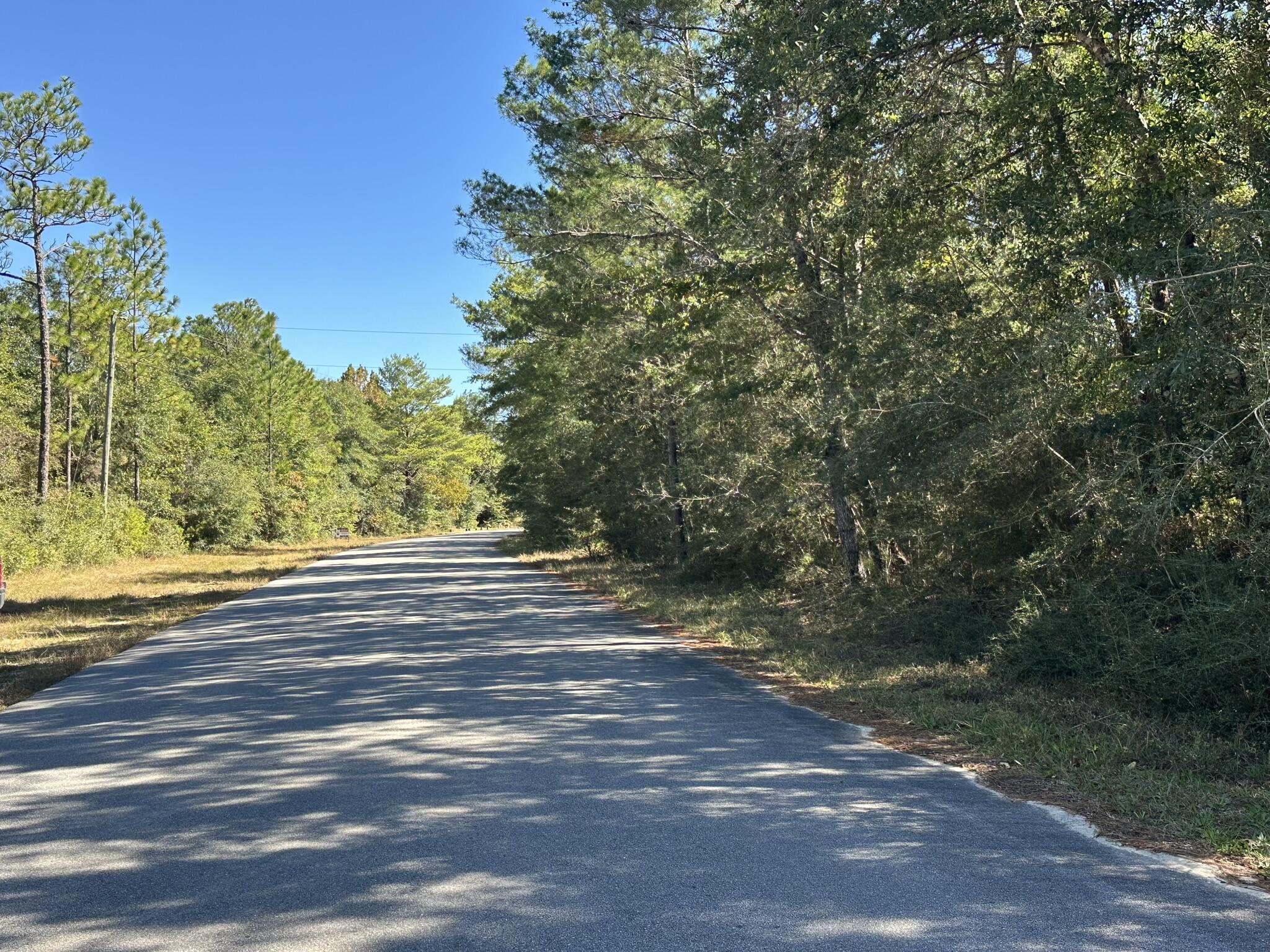 Discover the appeal of the Mount Olive Road area of Crestview—where open land and peaceful surroundings create an inviting setting for your next home site or investment. Located east of Shoal River in Okaloosa County, this parcel offers a true taste of North Crestview living, with convenient access to major routes while still providing a country atmosphere. Whether you're building now or planning for the future, this property places you in one of Crestview's most established and sought-after rural communities. The buyer & agent are responsible for verifying all information relevant to the purchase, including, but not limited to, zoning, utilities, and access, as part of due diligence. Okaloosa County considers this an unrecorded subdivision with 7 total lots.