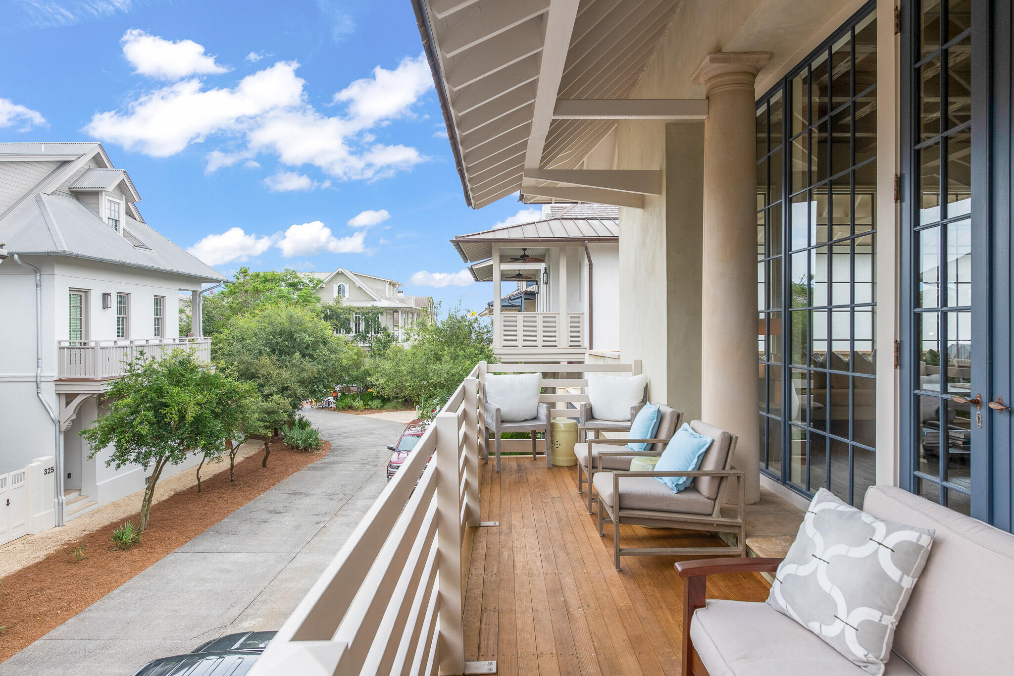 Under contract with a 72-hour kick out clause. A prime and coveted location on Rosemary Beach's south side, five tiers back from the Gulf and just steps to the beach walkover. This refined, architecturally significant residence was designed by Bobby McAlpine, with interiors appointed by Susan Ferrier, and presents sophistication and style for upscale coastal living.  True craftmanship is showcased with appointments that include the 12-foot reclaimed pecky cypress ceilings, 10-foot floor-to-ceiling windows and doors, and hardwood floors. The home lends a functional and comfortable layout, with three bedrooms, each with their own private bath, two laundries and a spacious and private courtyard.  The gourmet kitchen features all high-end appliances, two pantries and dual refrigerators, and a custom designed breakfast bar, and lends an open concept for entertaining.  The first level houses two guest rooms, each with en suite bathrooms, a separate bonus lounge area, and a smartly designed entry area with custom cabinetry for stowing items as you come in from the beach.  On the second level, an open main living space joins the chef's kitchen, an elegant dining area and dual luxury living areas, with doors opening to outdoor decks.  The two separate decks offer spaces for lounging and also as fresco dining, while enjoying the breeze and tranquil views of the Gulf of Mexico.  The third level encompasses the entire primary suite, including the spacious bedroom with sitting area, the walk-in closet and the master bath with double vanity and marble countertops.  Previously featured in Veranda Magazine, the posh residence is situated for full enjoyment of the pedestrian coastal lifestyle of Rosemary Beach, with proximity to the beach, the Barbados Pool and all the town center amenities. Only a stroll to the many popular boutiques and dining options.  Discover an idyllic beach life here at 332 West Water Street in the famed new urban community of Rosemary Beach, Florida.