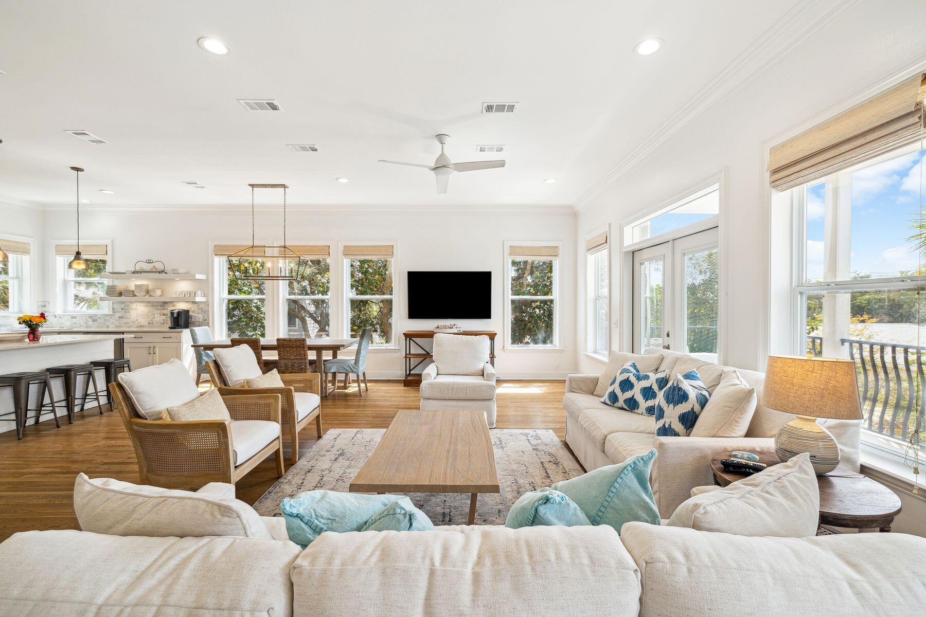 Positioned just one home back from iconic 30A, this refined coastal residence offers timeless charm, modern updates and sweeping gulf views—all in one of Seagrove's most desirable locations. With the beach only 171 feet away and Seaside, Florida, a short walk or bike ride, this five-bedroom, three-bathroom home is ideally suited for full-time living, a second home or an income-generating vacation rental. No HOA means more freedom and flexibility to enjoy the property your way. Classic Charleston-style architecture meets relaxed coastal elegance across three spacious levels. The open-concept main living area features soaring ceilings, abundant natural light and hardwood floors recently refinished in 2024. The updated kitchen and bathrooms bring a modern edge to this thoughtfully designed space, while fresh furnishings in the living area (2024) create a welcoming place to gather.

Ideal for hosting guests or creating multi-use living zones, the home includes five bedroomsone of which is a bunk roomand three full baths. The third-floor primary suite is a highlight, offering private balcony access and a stunning gulf view that makes every sunrise and sunset feel like a special occasion.

Step outside to your own private oasis. The backyard is fully fenced and features mature trees for natural shade, a large paver patio and a sparkling poolperfect for lounging, grilling and entertaining. A two-car garage with newly epoxied flooring adds both style and function, along with extra driveway parking.

Additional features include a brand-new metal roof (2025), refinished hardwoods, updated interiors and close proximity to beloved 30A spots like Surfing Deer, Seaside's Airstream Row and Grayton Beach State Park.

This is the best of Old Seagrove: gulf views, beach access just steps away, quiet streets lined with oaks and the charm of classic 30A livingwithout the restrictions of an HOA. A rare opportunity to own a timeless coastal home in one of the most sought-after neighborhoods on the gulf.