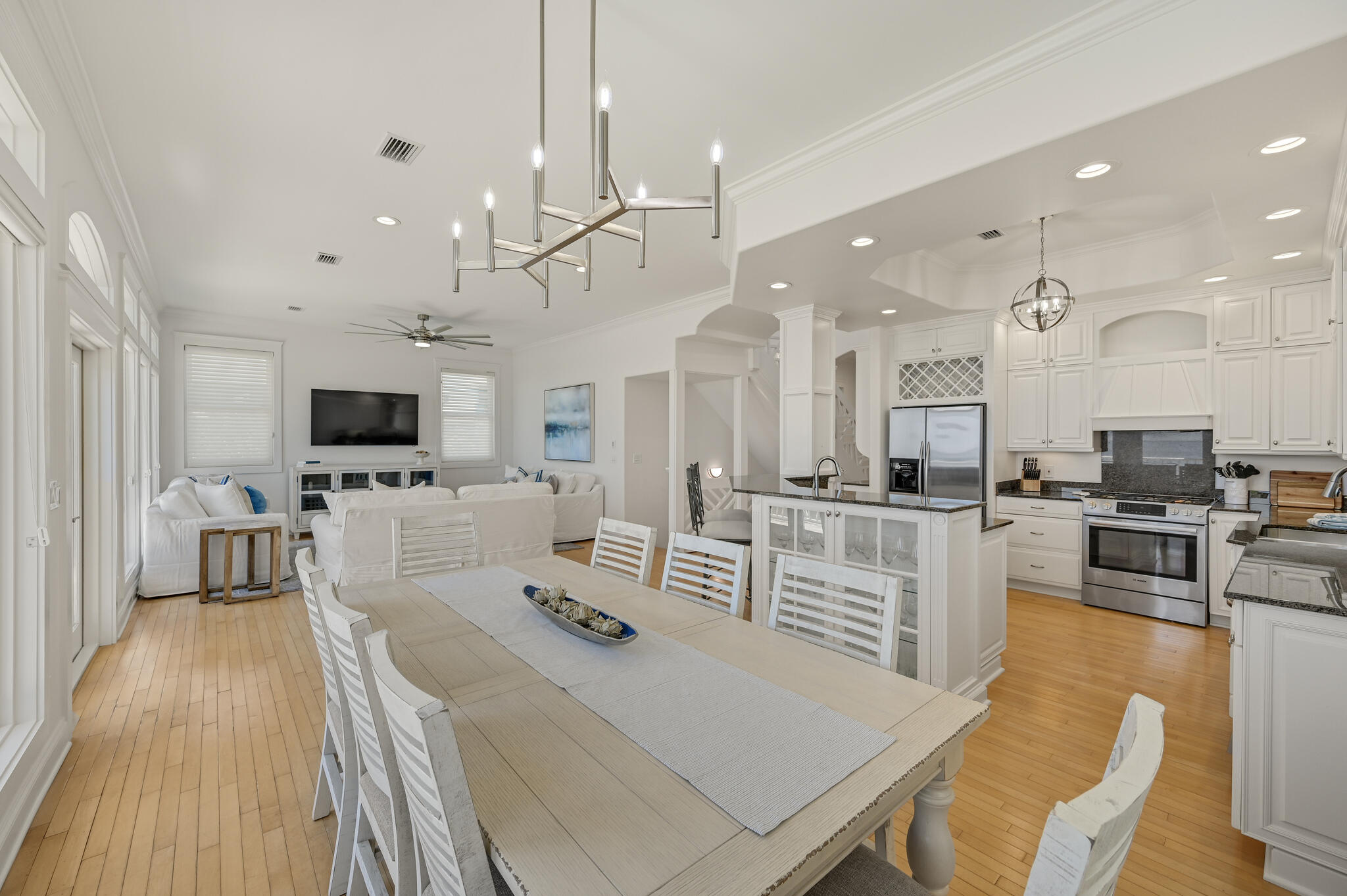 Discover coastal luxury at its finest with this stunning gulf-front Seagrove Beach Cottage, located at 36 S San Juan Avenue, Santa Rosa Beach, FL 32459. This exquisite 4-bedroom, 3-bathroom home spans 3 floors with 57 feet of breathtaking beach frontage, offering direct access to a serene, uncrowded beach via a private boardwalk through a secluded tree arbor atop a high dune. Renovated in 2022, 36 San Juan features a fresh, coastal design with all-new furnishings, making it the perfect family retreat or investment opportunity. The first floor offers a king bedroom, a full bath, and an entertainment room with a wet bar and sleeper sofa, providing easy access to the beach walkover. The second floor showcases a spacious living-kitchen-dining area with sensational Gulf views from the full length balcony. New GE Monogram appliances were installed in 2024. Two bedrooms, and a large laundry room finish this floor. Ascend the two story open stairwell to the third-floor master suite, capturing views of the sparkling white sandy beach. Amenities include a large bathroom, soaking tub, private balcony, walk in closet, and adjustable base bed. Outside, upgrades include a new roof, new interior and exterior paint, new AC units, a new paver driveway, and new landscaping for the large rear yard. With no HOA fees and a prime location just a short bike ride from Seaside and central to all of 30A's dining, shopping, and entertainment, this cottage offers both exclusivity and convenience, and is perfect as a primary residence, vacation home, or rental property. Don't miss the chance to own this slice of paradise in the heart of Seagrove Beach.