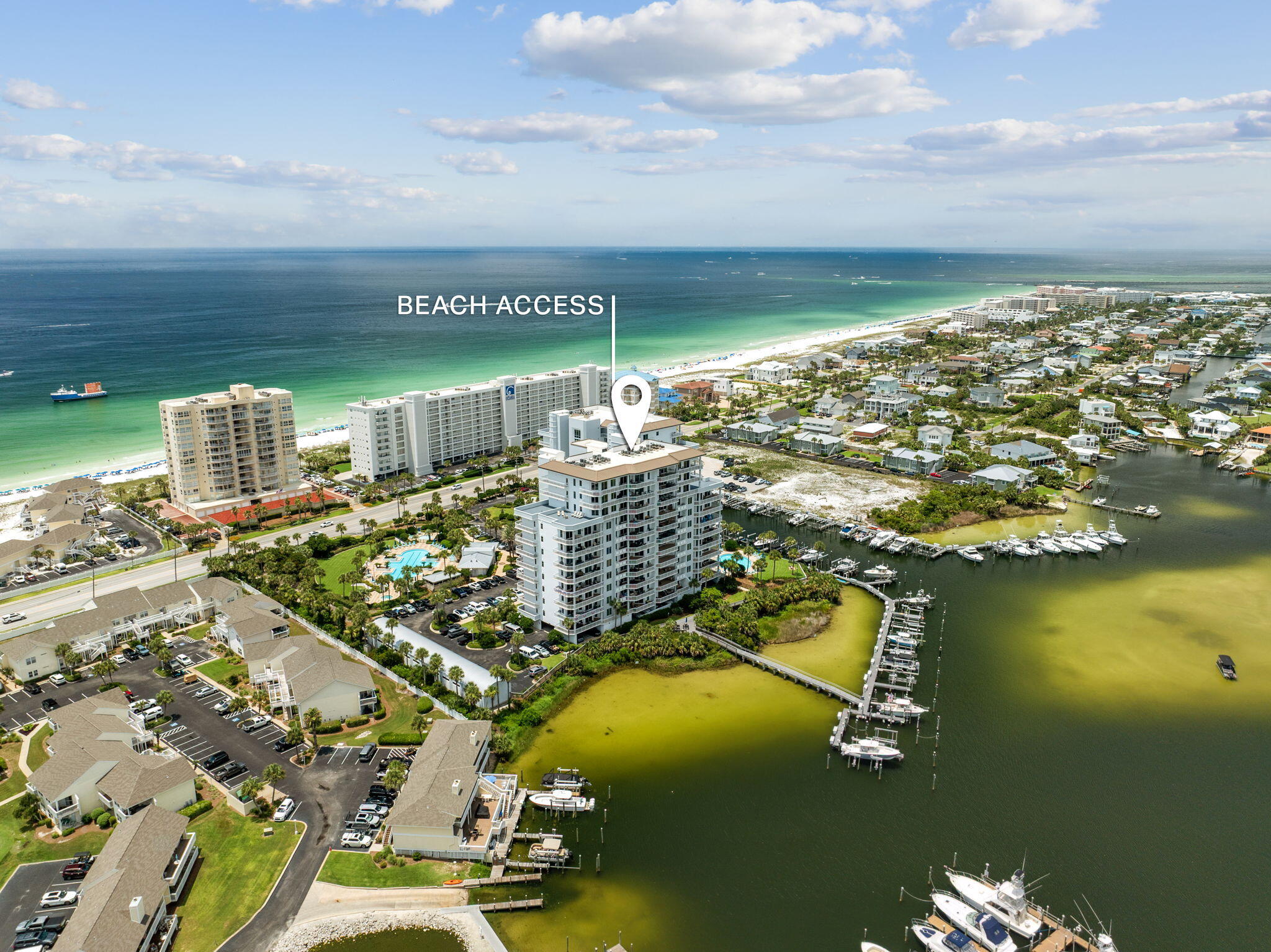 Welcome to Destin's newest Penthouse on the market — a stunning, one-of-a-kind coastal retreat perched on the 9th floor of Harbor Landing. Boasting over 3,200 sq. ft. of luxury living space offering breathtaking panoramic views of both the Gulf and the vibrant Destin Harbor.

From the moment you step inside, you're greeted by an open-concept design flooded with natural light and wrapped in elegance. Sophisticated finishes and thoughtfully curated furnishings create a warm yet upscale atmosphere throughout. Each bedroom offers private ensuite bathrooms, including two master suites with king beds, jetted tubs, and walk-in showers. The fourth bedroom features a motorized adjustable queen bed for personalized comfort.

Step outside to your private balcony or ascend to your rooftop patio sanctuary, where sunsets and starlit skies provide the perfect backdrop for unforgettable evenings. With garage parking, exclusive beach access, and a sparkling community pool and fitness center, this penthouse checks every box for refined coastal living.

Bonus Feature: This unit conveys with its own deeded boat slip at the onsite marina on the Destin Harbor  a rare and coveted amenity perfect for boat owners and water enthusiasts.

Ideally located in the heart of Destin, you're just a short stroll from the sugar-white sands, or hop on a water taxi to explore HarborWalk Village, Crab Island, or some of the best waterfront dining on the Emerald Coast. Adventure, relaxation, and luxury all await at this Penthouse.