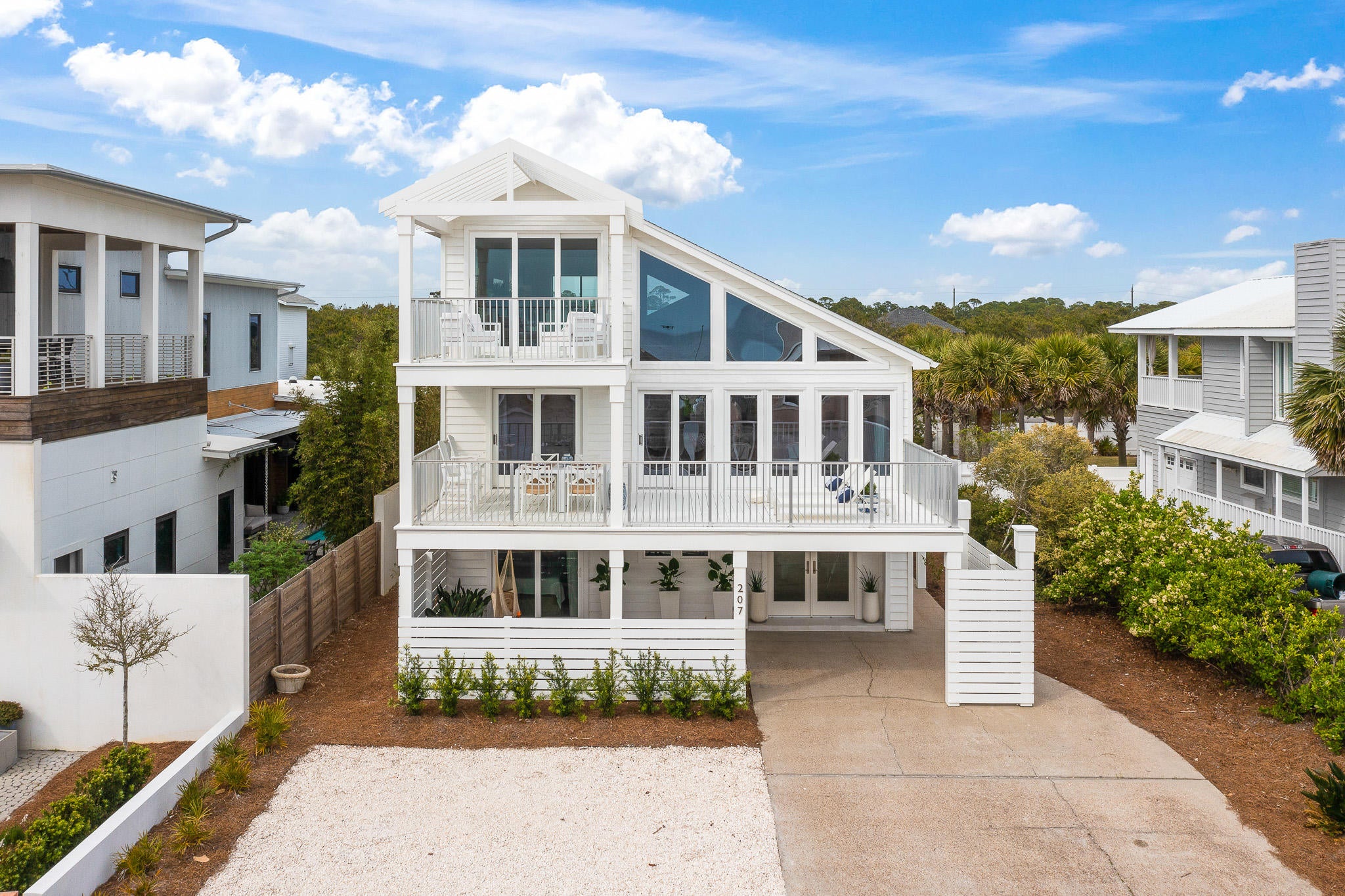 Hidden jewel on 30a! This non-rental neighborhood sits immediately adjacent to Alys Beach yet maintains that quiet old Florida charm that is so rare these days.  Home was completely gutted and renovated to capture the stunning Gulf views from all three floors. Pecky cypress ceilings accentuate and add interest to the elegant white décor. Vaulted ceilings in the master suite and pebble tile detailing in guest baths are just a few things that make this home so unique. Sit on the second or third floor balconies and take in the direct ocean breeze or hang out by the gas firepit in the large, scrub oak lined backyard (with plenty of room for a pool addition). The private beach is second to none, and the neighborhood access boardwalk is only steps from your front door.