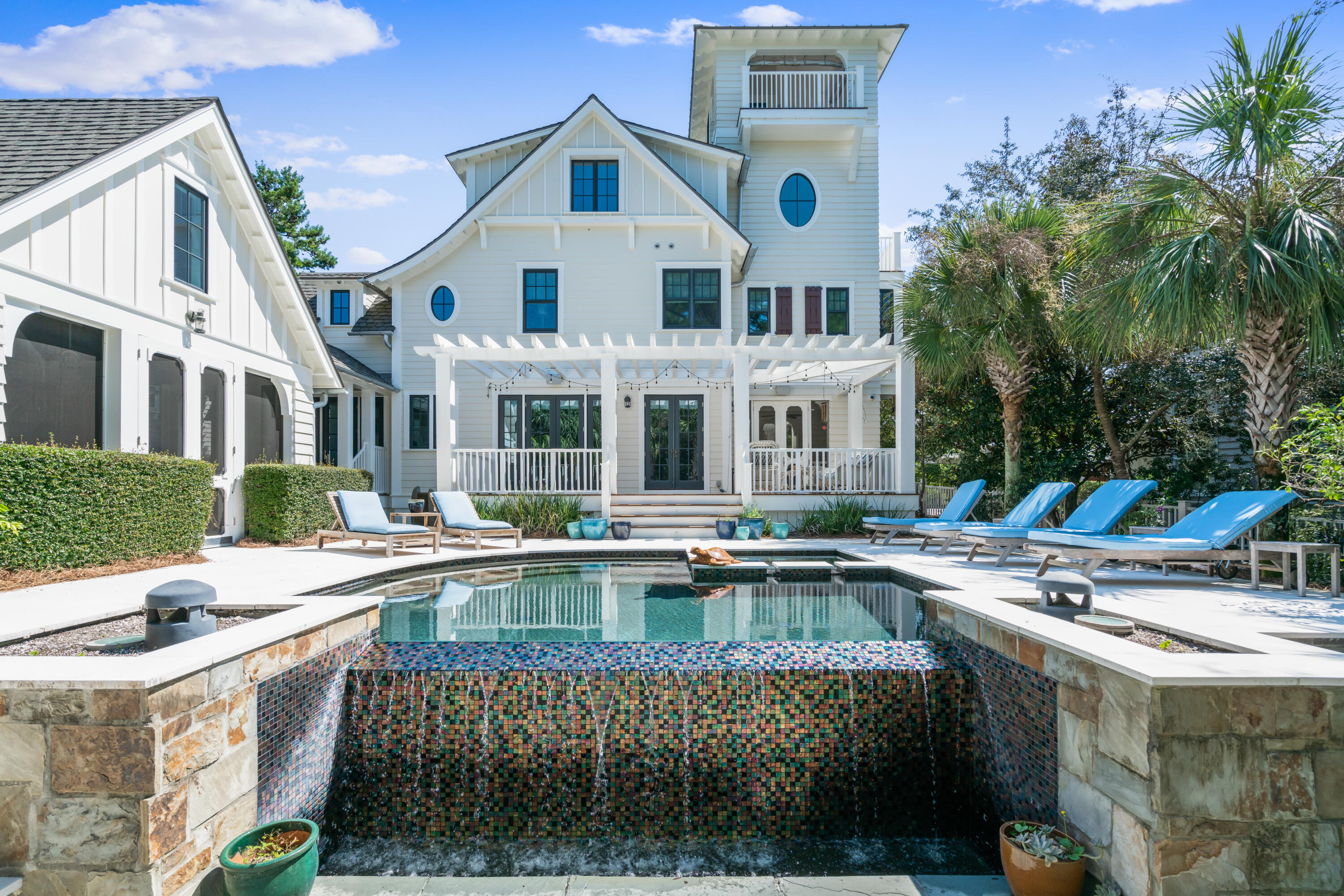 Gulf Views!!! Amazing custom built beach home located on one of the largest, most private lots in all of Watersound Beach! Designed by T.S. Adams and built by Gulfview Construction, this very special beach residence comes fully furnished and features an open concept layout with 4 bedrooms, 6 baths, 4,280 sq ft of heated and cooled space, multiple open and covered porches, a large 3rd floor bonus room with multiple sitting areas and workspaces, a lovely 4th floor tower with beautiful forever Gulf Views and a spectacular, oversized back yard with a Private Pool and Cabana Porch! 

The spacious and tranquil backyard truly is a rare gem in Watersound Beach and is arguably the centerpiece of this beautiful home.