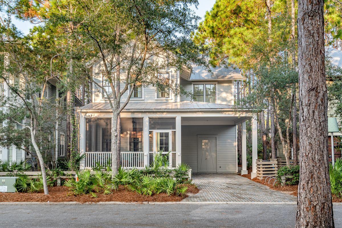 Ideally located just steps from Camp WaterColor, this four-bed, four-and-a-half-bath home features an owner's suite on the first floor and large screened porches for enjoying natural surroundings.

Located in Phase II of WaterColor, this home is being sold fully furnished, making it an ideal option for a vacation retreat or rental investment. Consuming 2,393 square feet of living space, this home sits on a leafy lot. The owner's suite on the first floor features a large walk-in closet and all bedrooms in this home have en suite baths. A gourmet kitchen will appeal to home chefs. Situated across from a pocket park, this home boasts hardwood flooring throughout and fresh paint. All of WaterColor's coveted amenities are available to the owner of this home including neighborhood pools, the WaterColor Beach Club, Camp WaterColor with its lazy rivers, play areas and restaurants, and all of the shopping and dining options available at WaterColor Crossing and Scenic Highway 30A beyond.